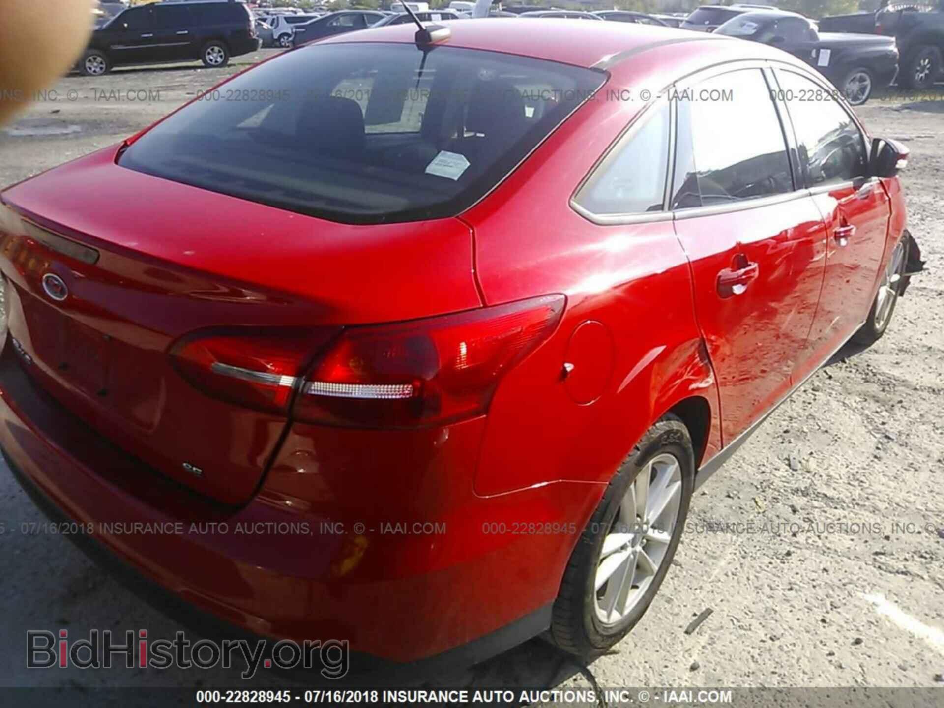 2015 Ford Focus - VIN: 1FADP3F21FL264834 - Photo 4