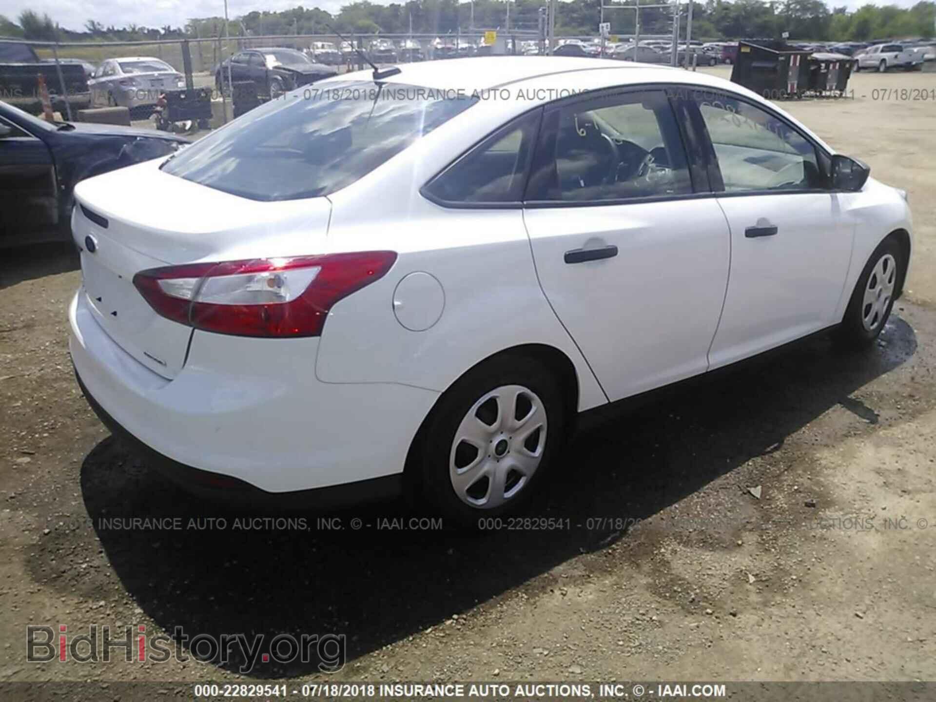 2014 Ford Focus - VIN: 1FADP3E2XEL211775 - Фото 4