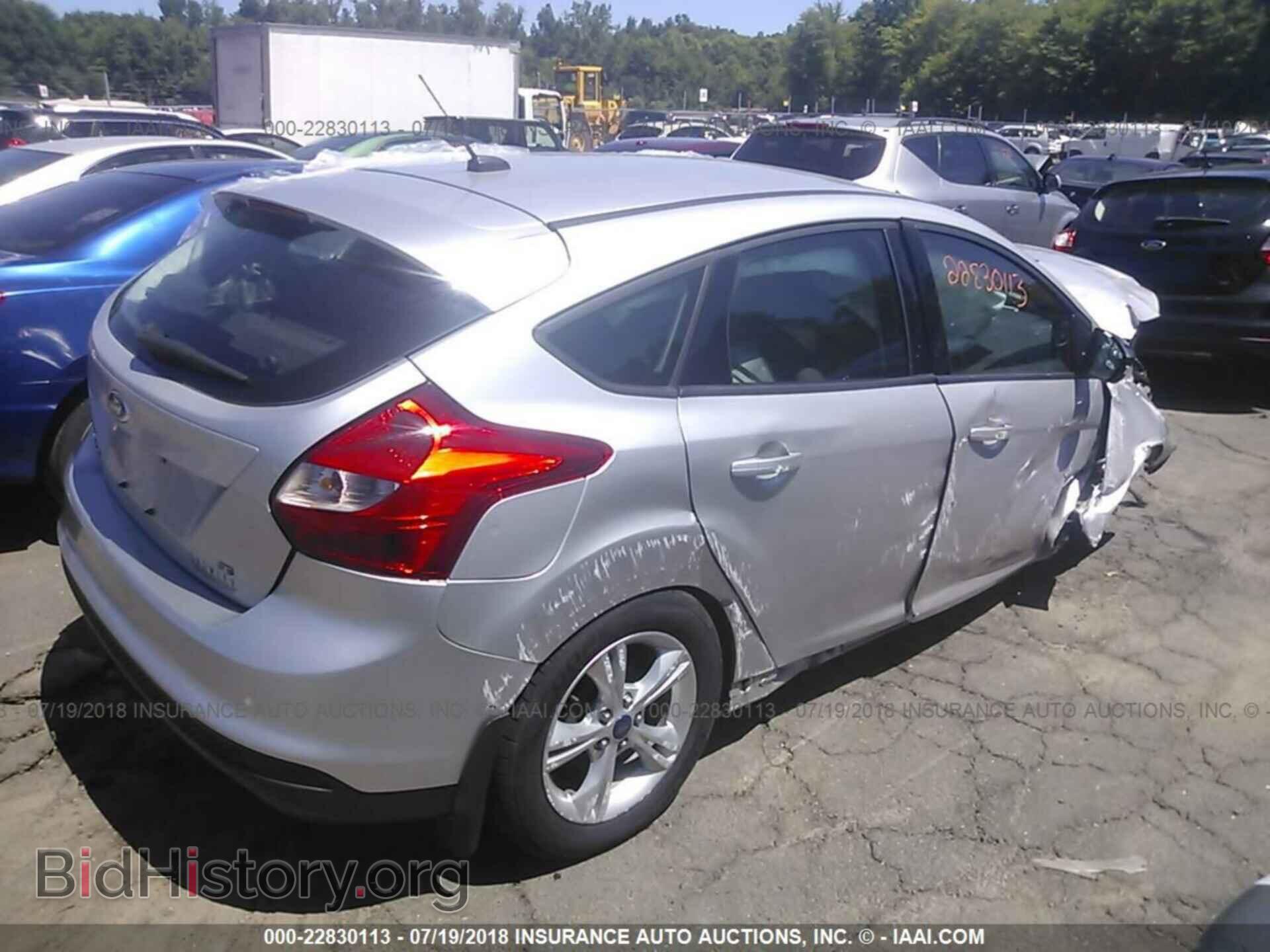 2014 Ford Focus - VIN: 1FADP3K24EL102104 - Фото 4