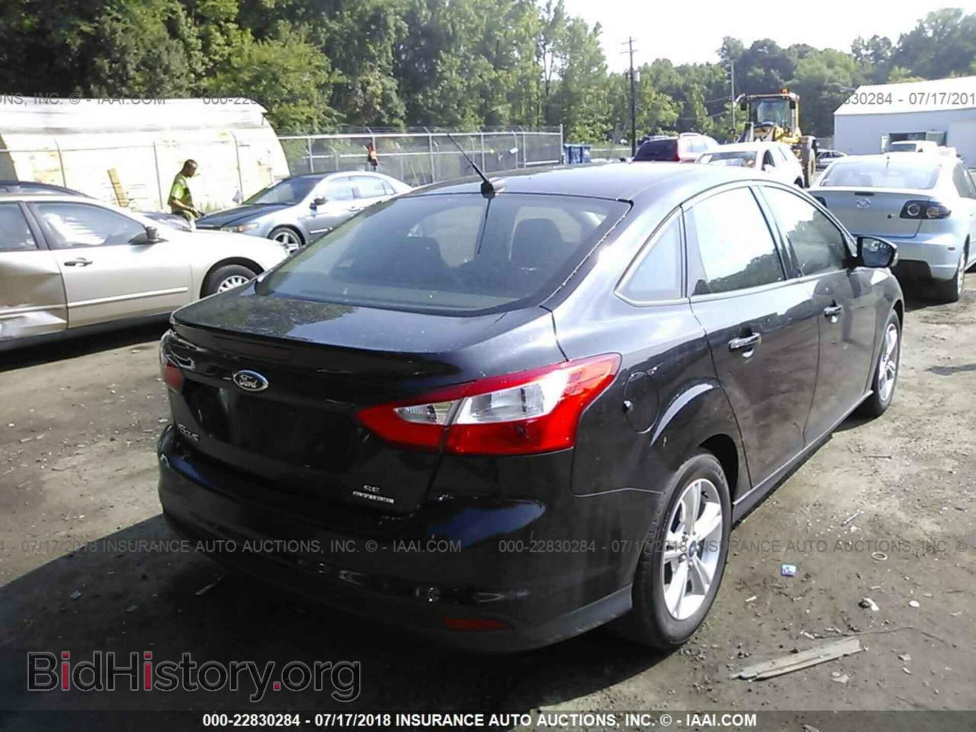 2013 Ford Focus - VIN: 1FADP3F2XDL286084 - Photo 4