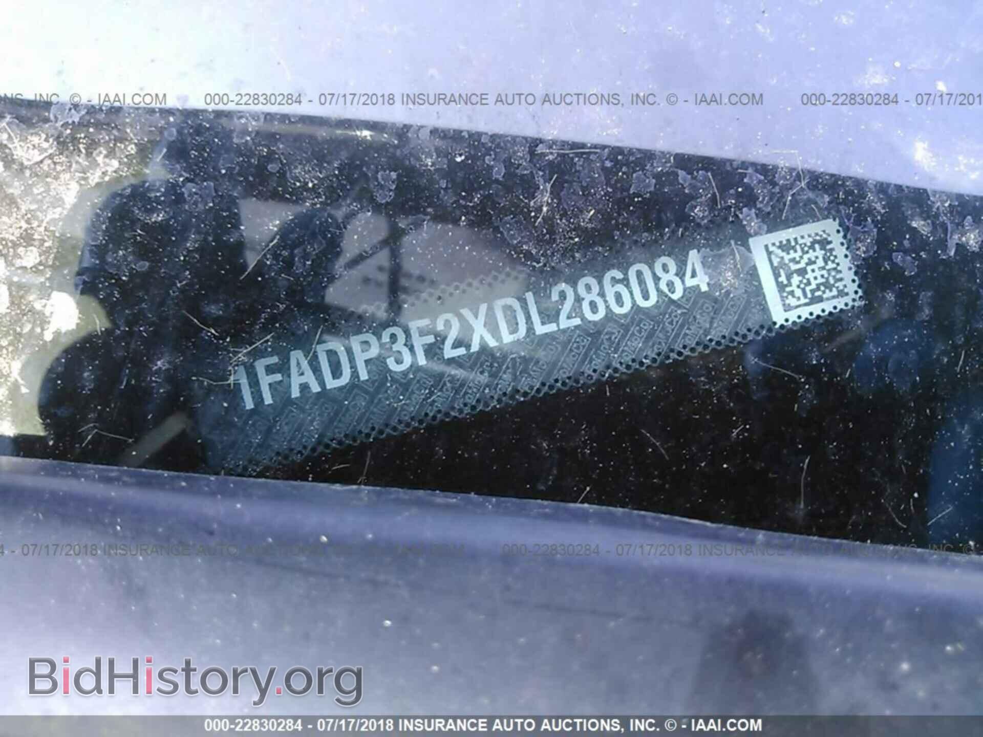 2013 Ford Focus - VIN: 1FADP3F2XDL286084 - Photo 9