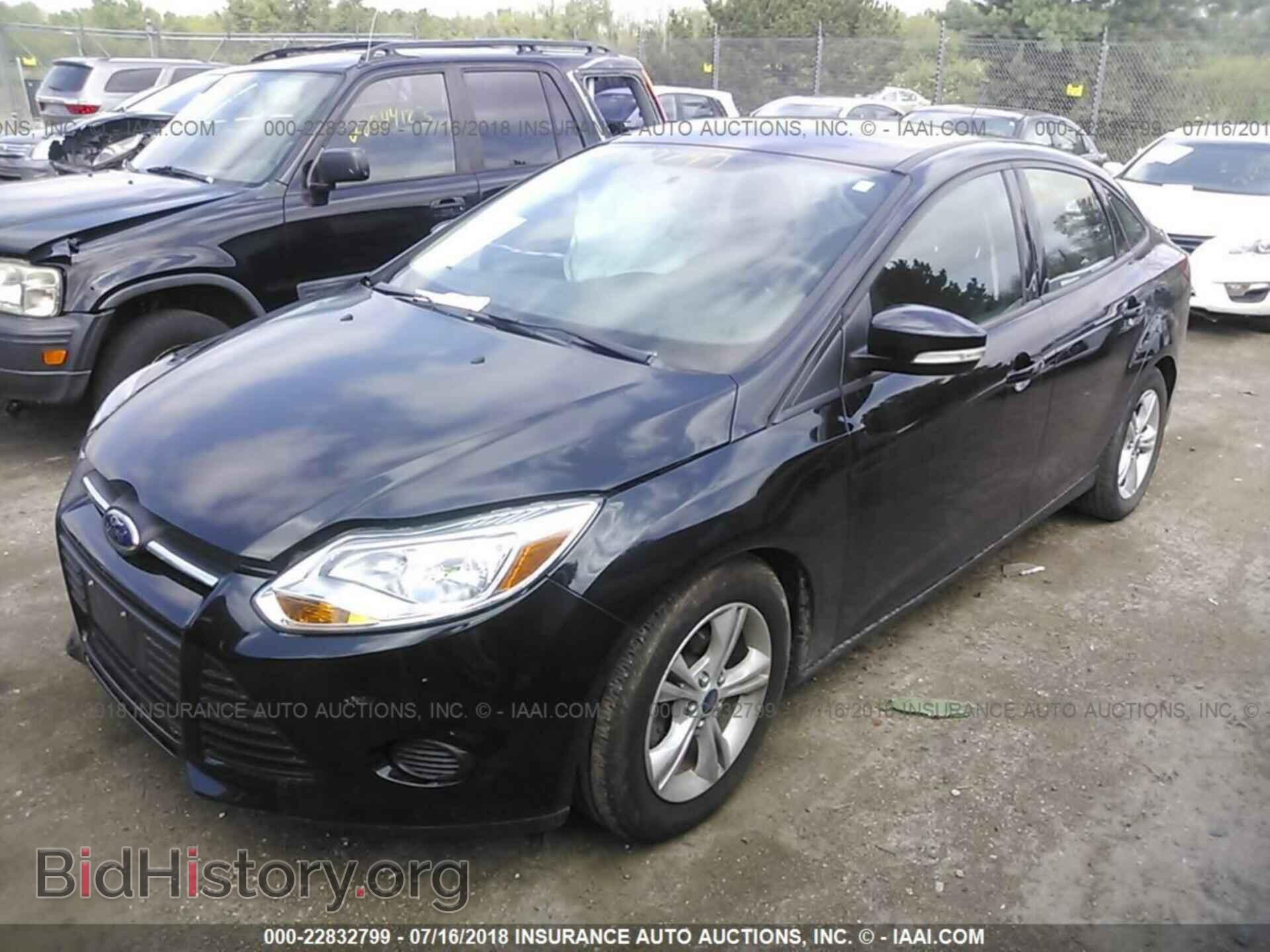2014 Ford Focus - VIN: 1FADP3F26EL360747 - Photo 2