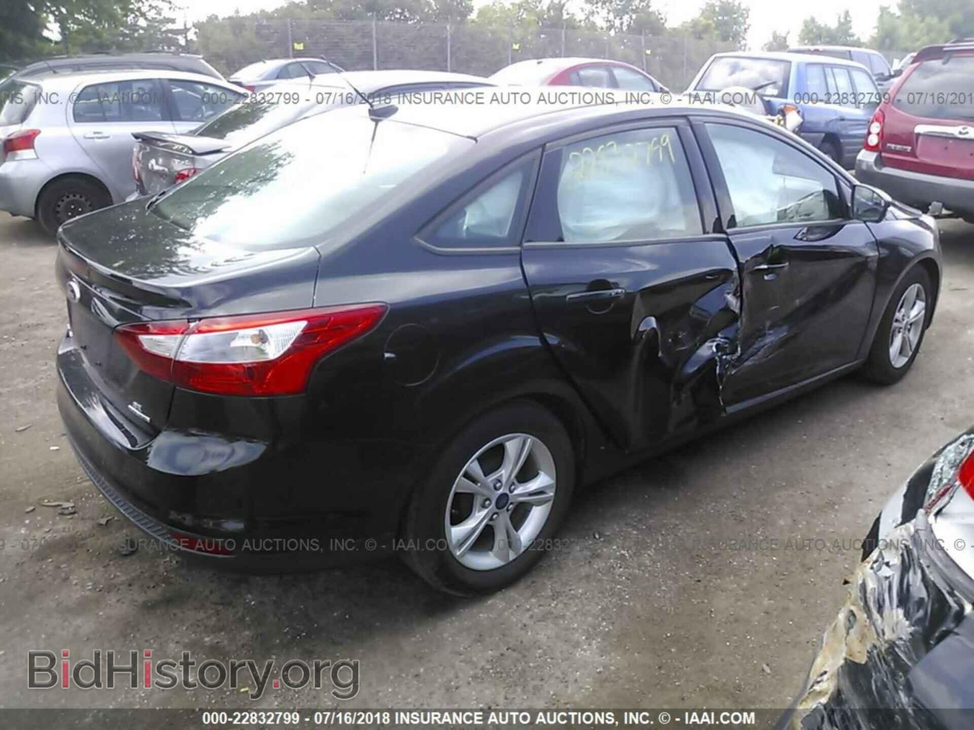 2014 Ford Focus - VIN: 1FADP3F26EL360747 - Photo 4