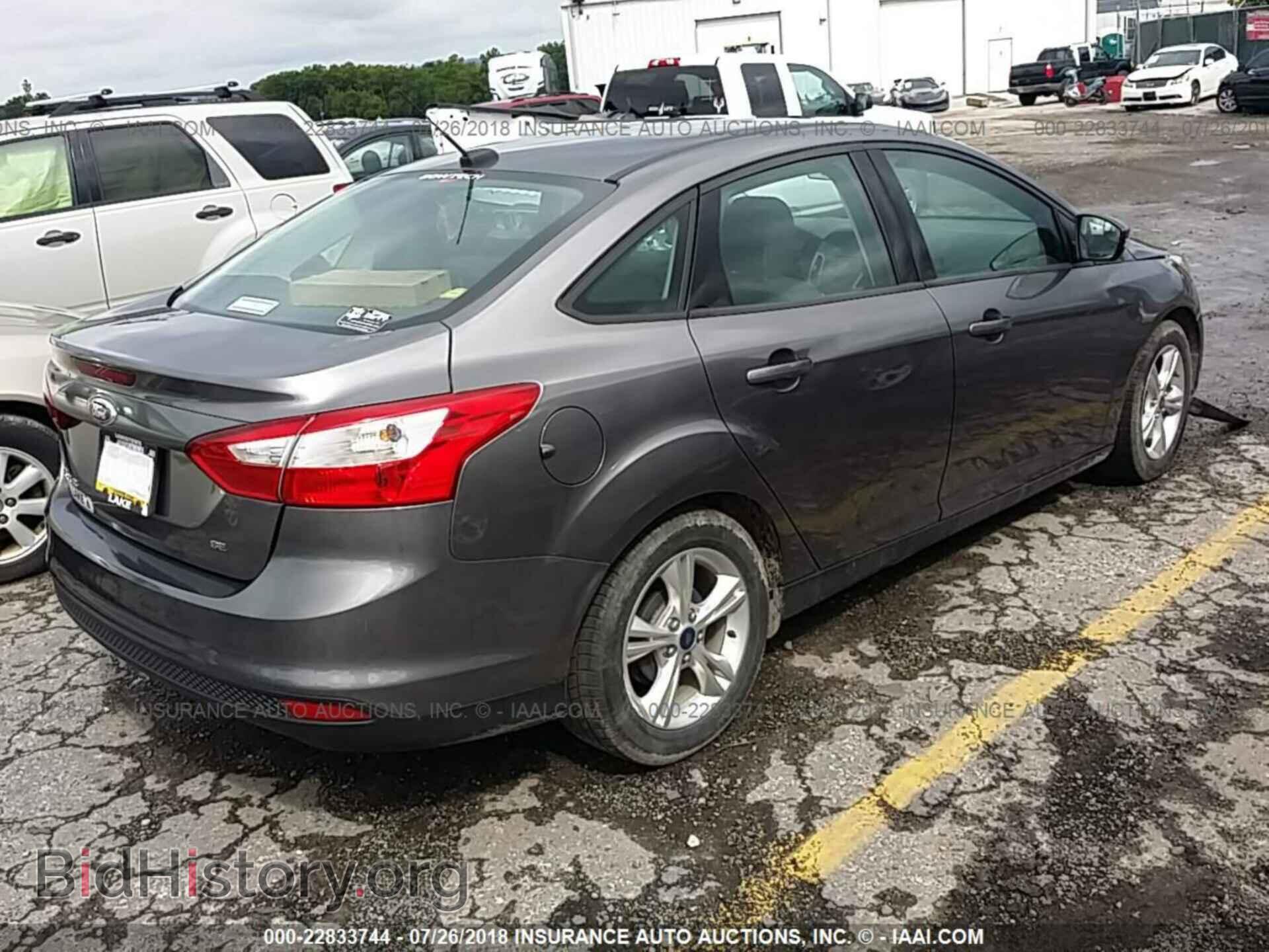 2014 Ford Focus - VIN: 1FADP3F22EL189186 - Фото 4