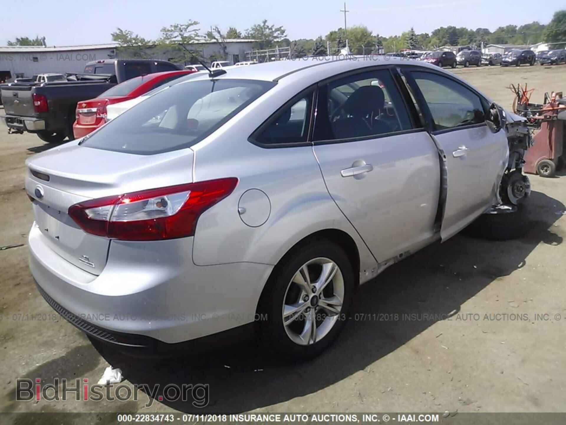 2014 Ford Focus - VIN: 1FADP3F23EL361998 - Photo 4