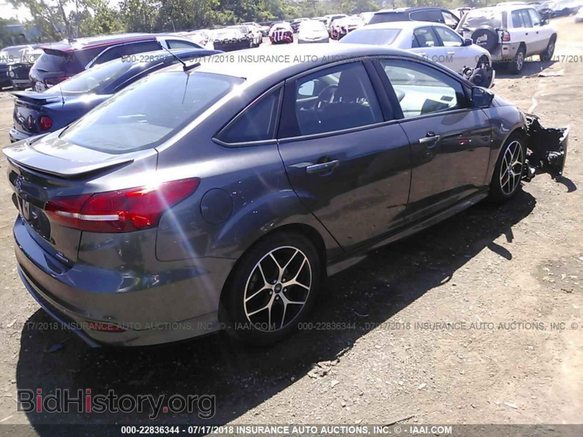 2016 Ford Focus - VIN: 1FADP3F21GL243323 - Фото 4