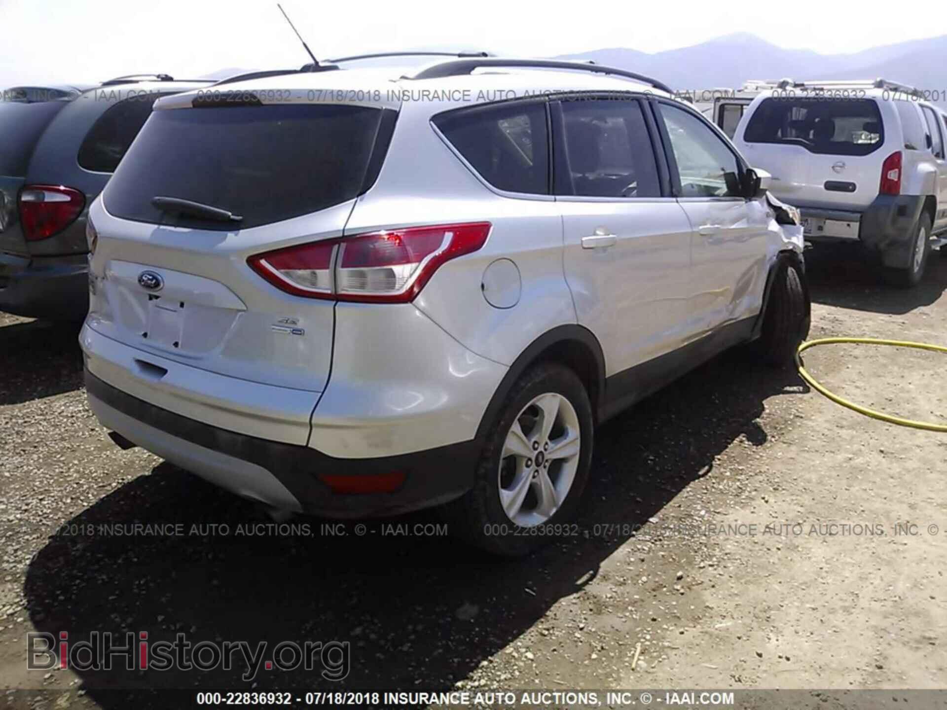 2014 Ford Escape - VIN: 1FMCU9GX3EUB10562 - Фото 4