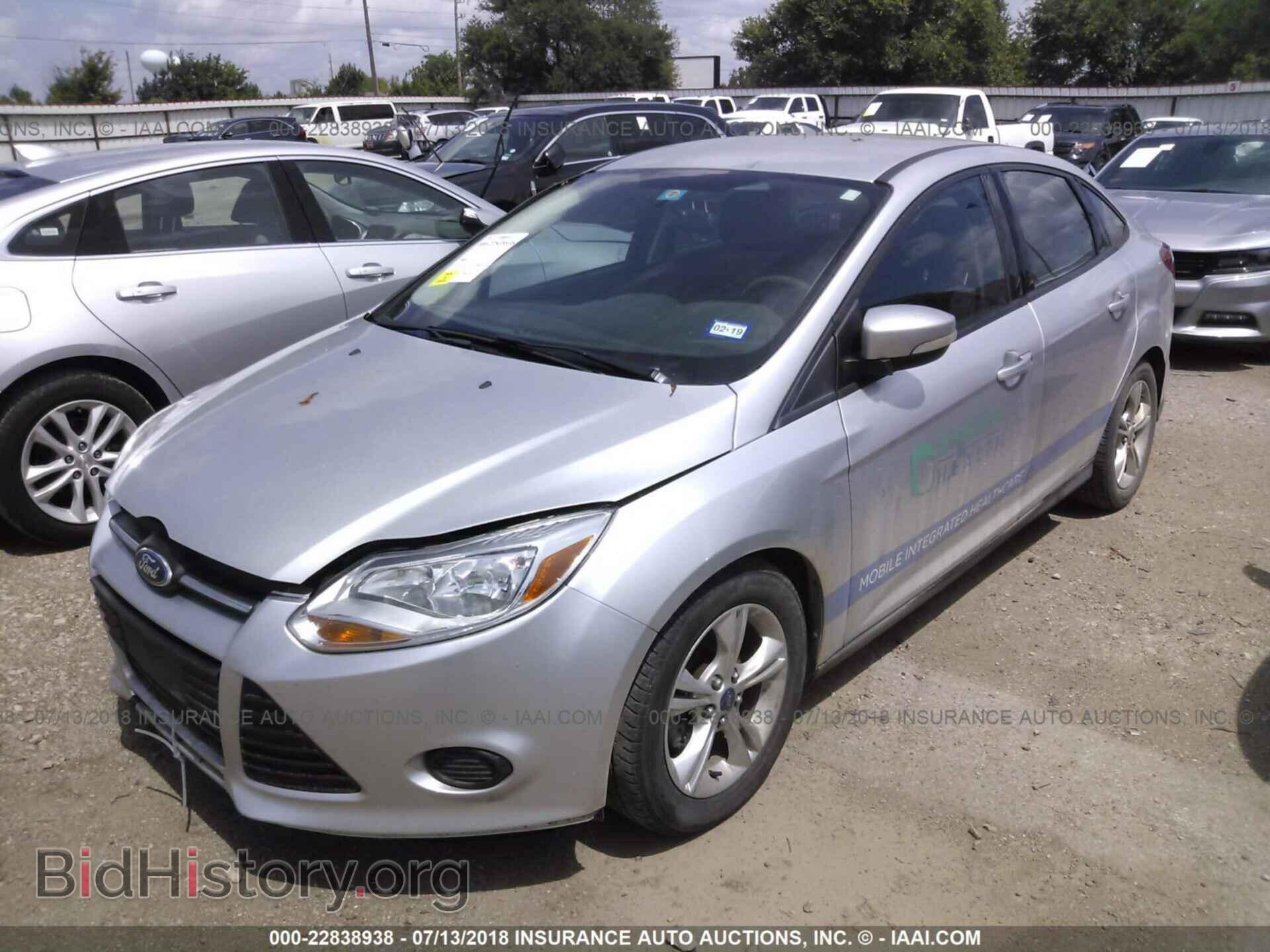 2014 Ford Focus - VIN: 1FADP3F23EL288325 - Фото 2