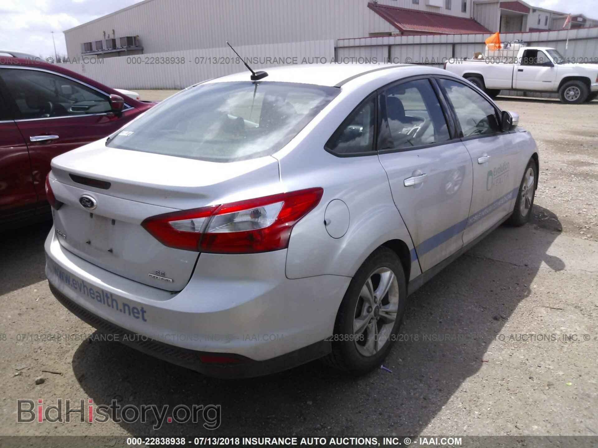 2014 Ford Focus - VIN: 1FADP3F23EL288325 - Фото 4