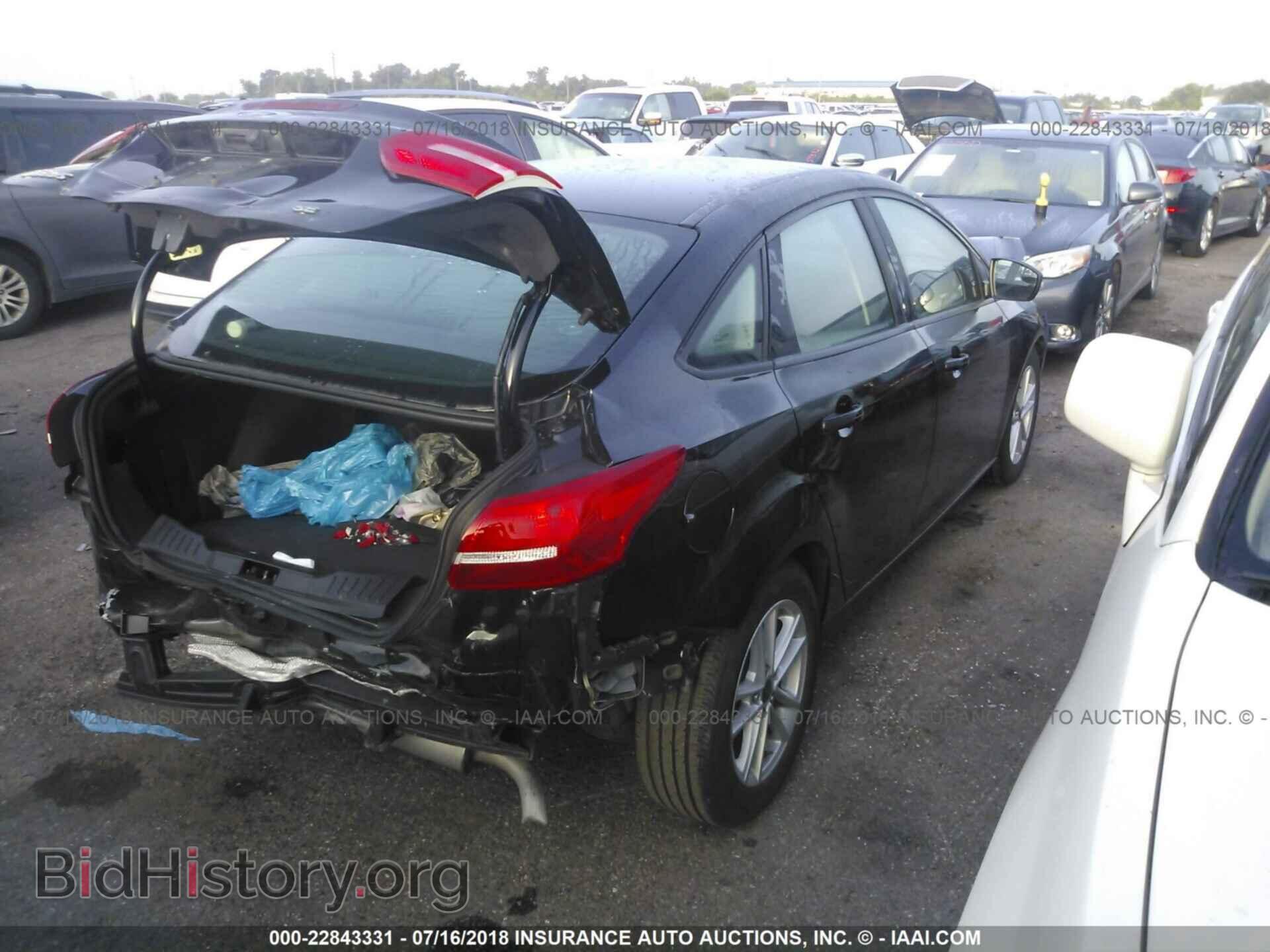 2017 Ford Focus - VIN: 1FADP3F28HL251713 - Photo 4