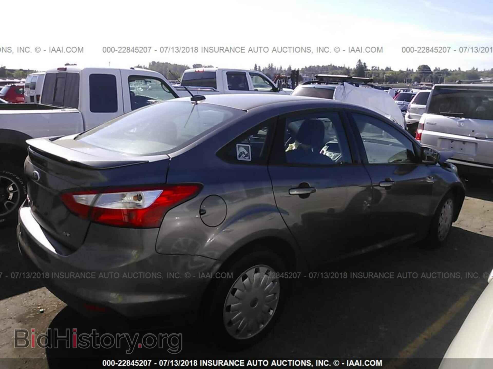 2012 Ford Focus - VIN: 1FAHP3F26CL155718 - Photo 4