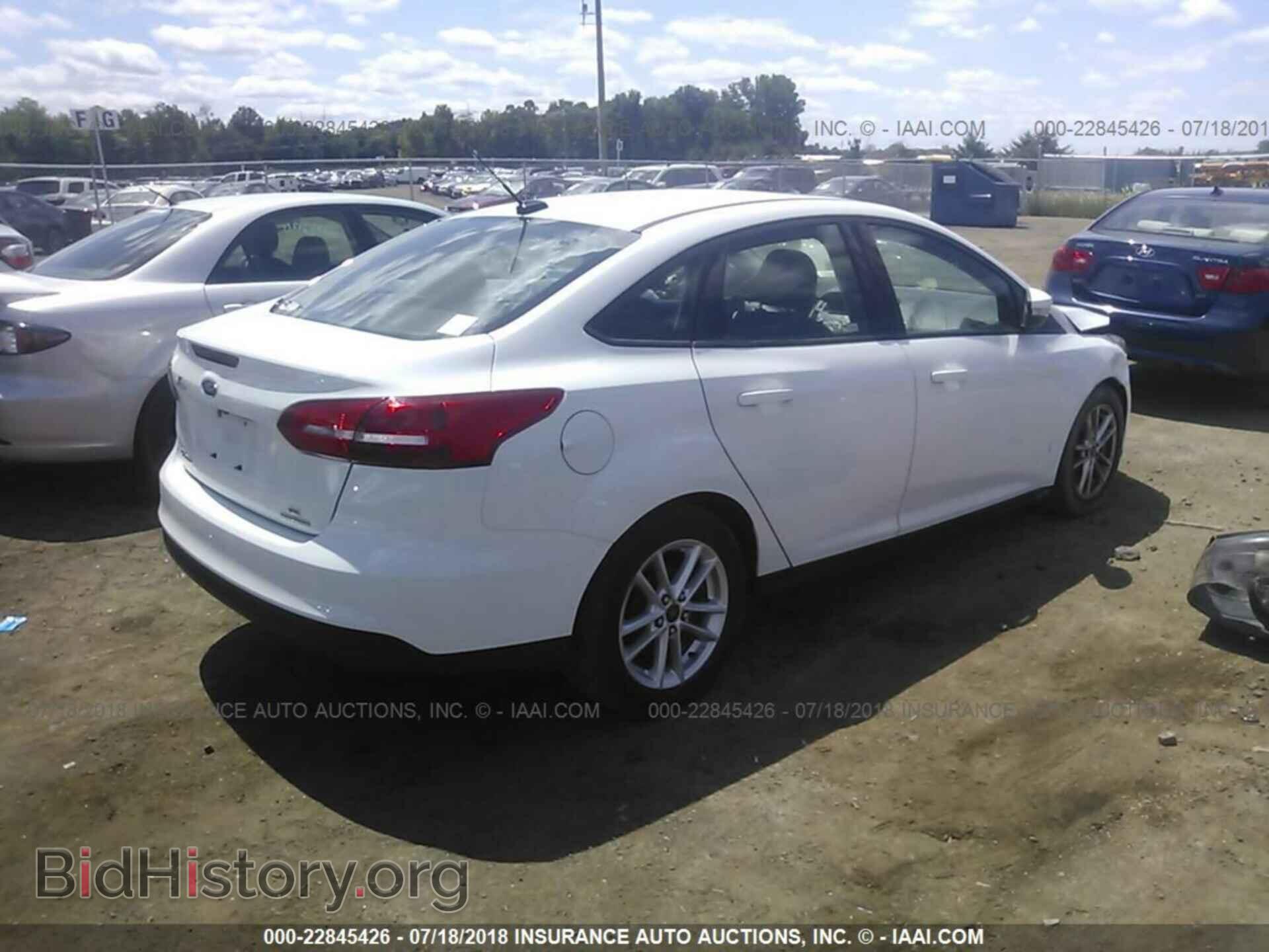 2015 Ford Focus - VIN: 1FADP3F27FL289253 - Photo 4