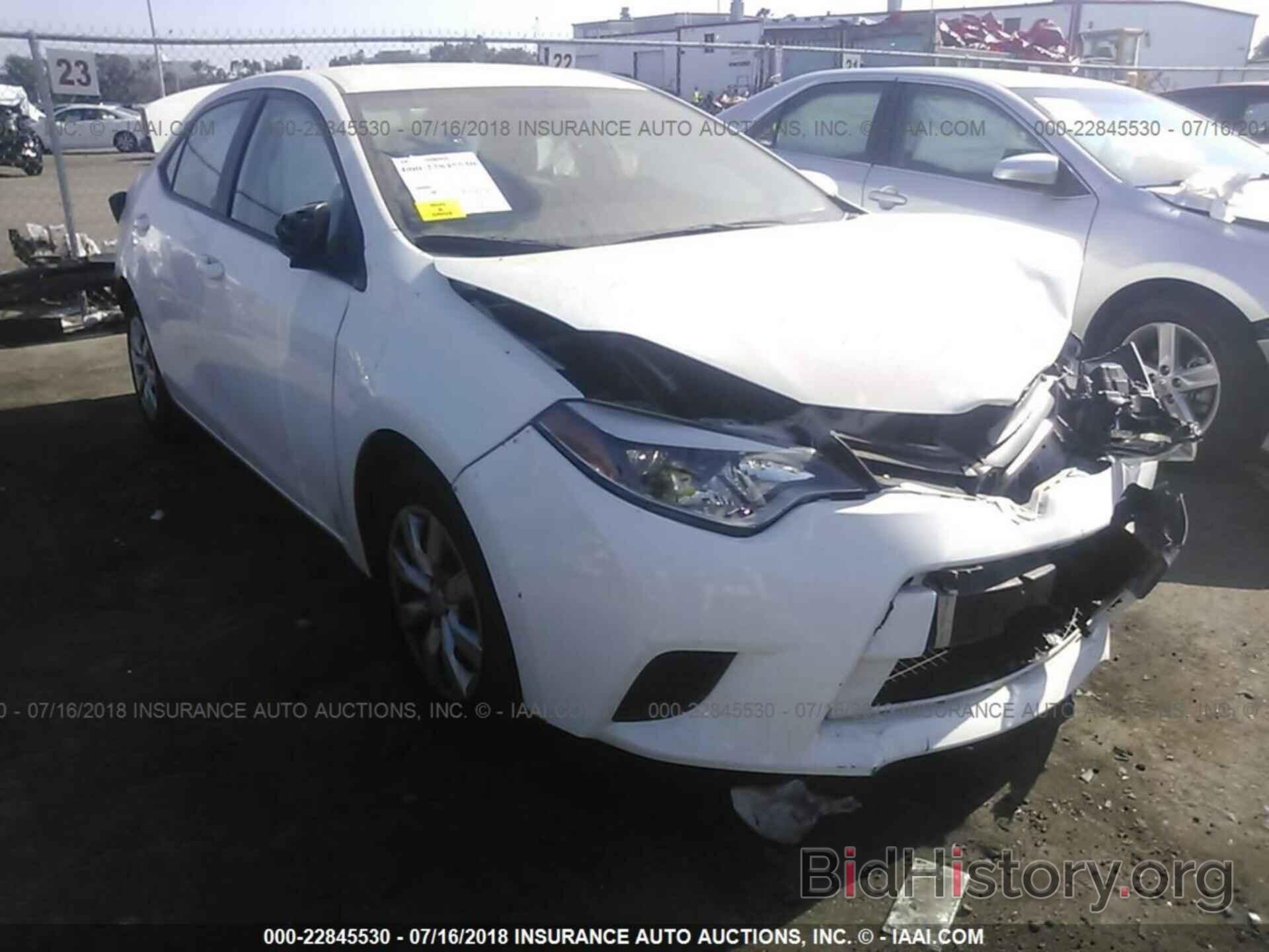 Photo 5YFBURHE0EP146090 - Toyota Corolla 2014