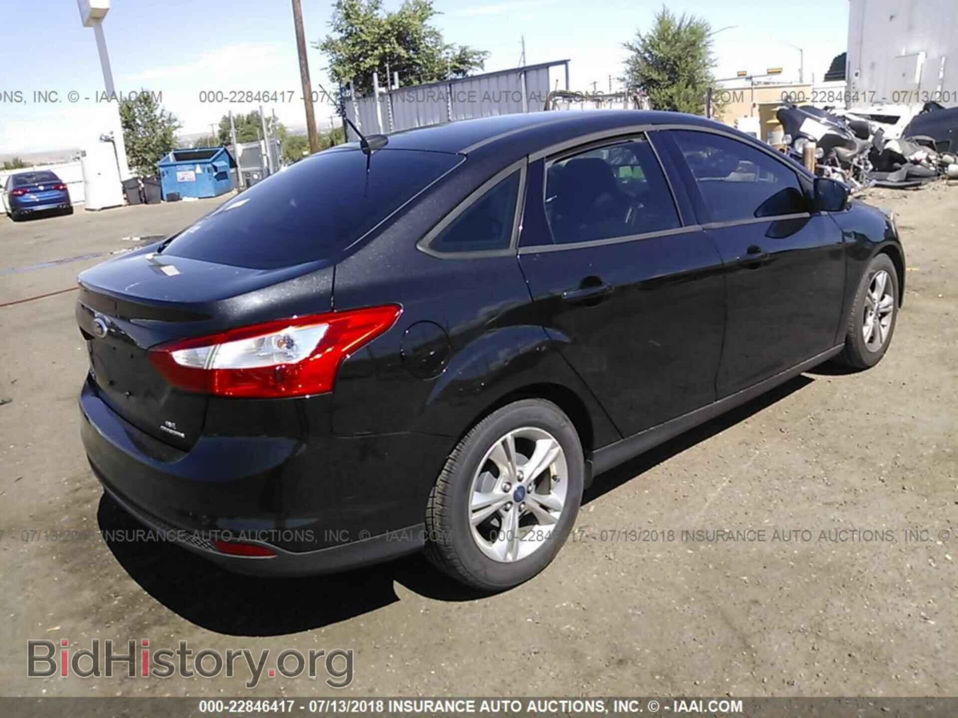 2013 Ford Focus - VIN: 1FADP3F28DL221475 - Photo 4