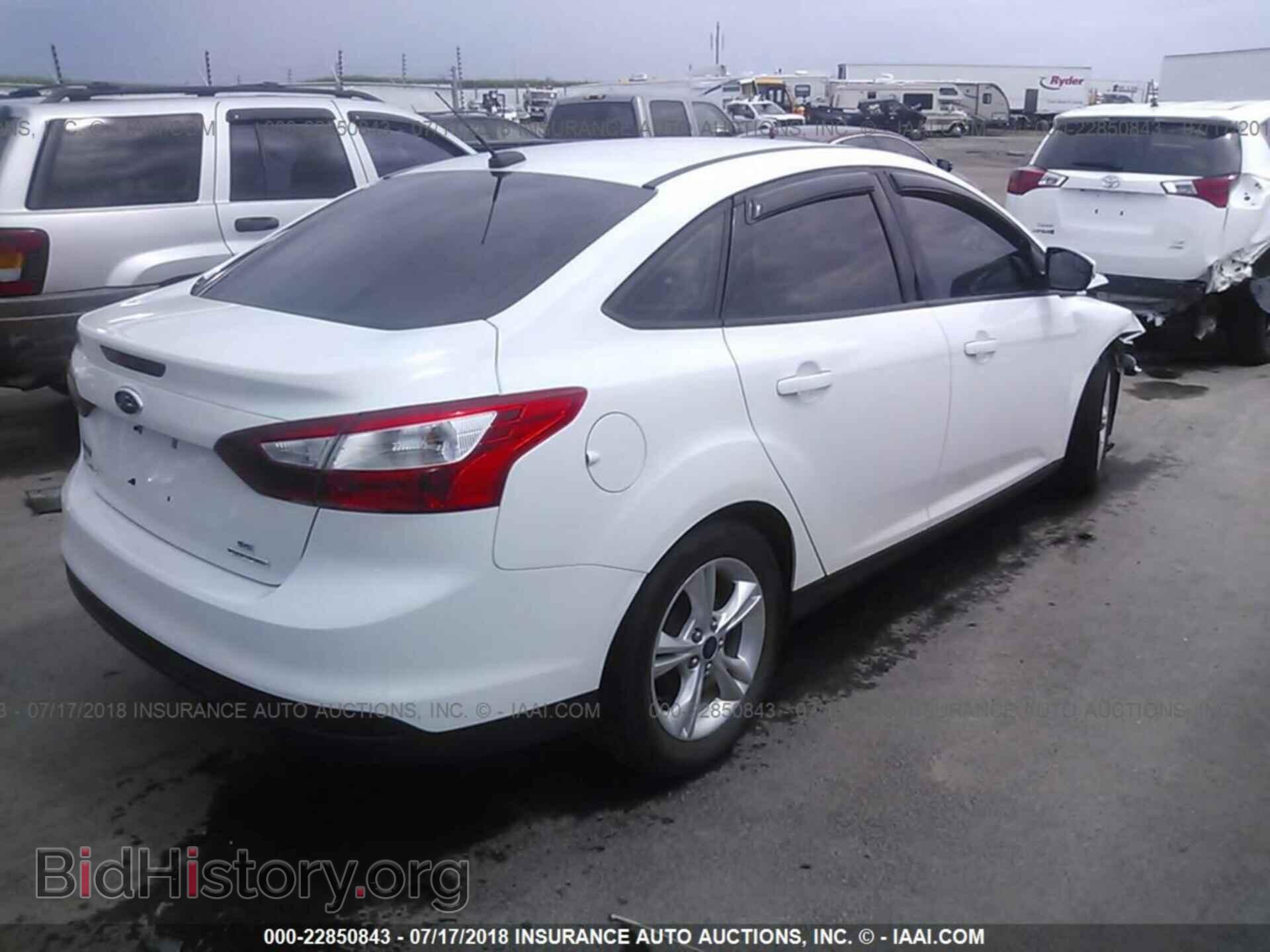 2014 Ford Focus - VIN: 1FADP3F20EL259347 - Фото 4