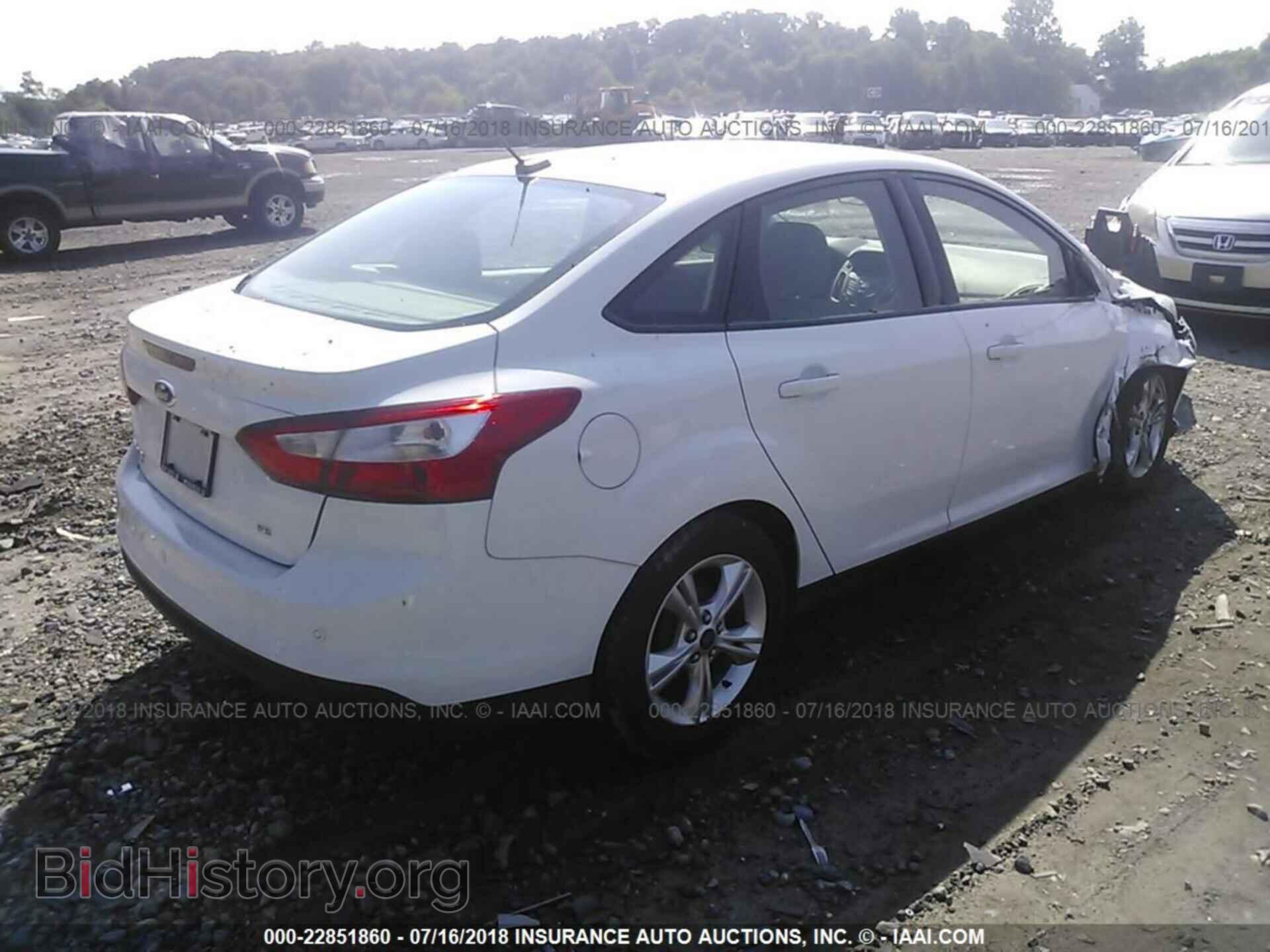 2014 Ford Focus - VIN: 1FADP3F22EL165020 - Фото 4