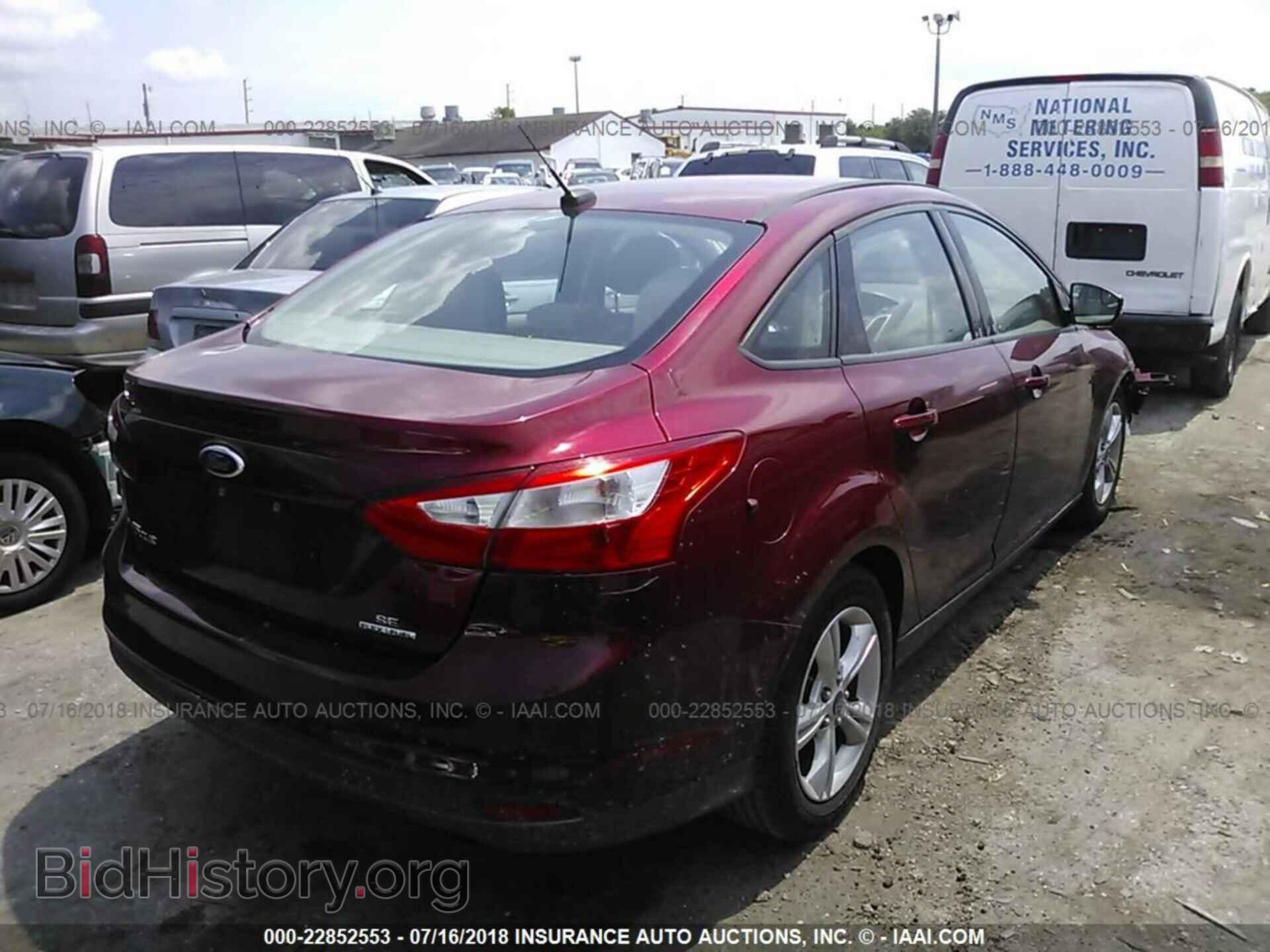 2014 Ford Focus - VIN: 1FADP3F24EL345809 - Photo 4