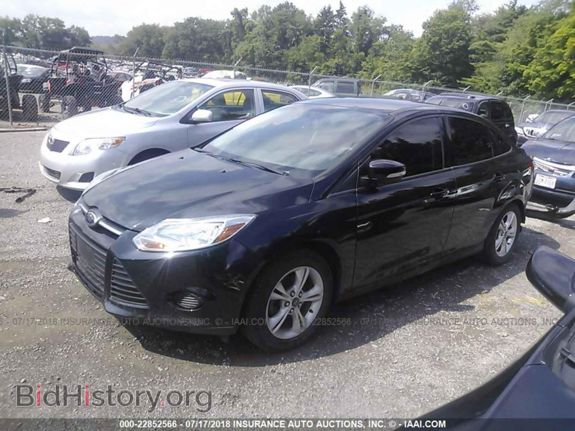 2014 Ford Focus - VIN: 1FADP3F27EL184792 - Photo 2