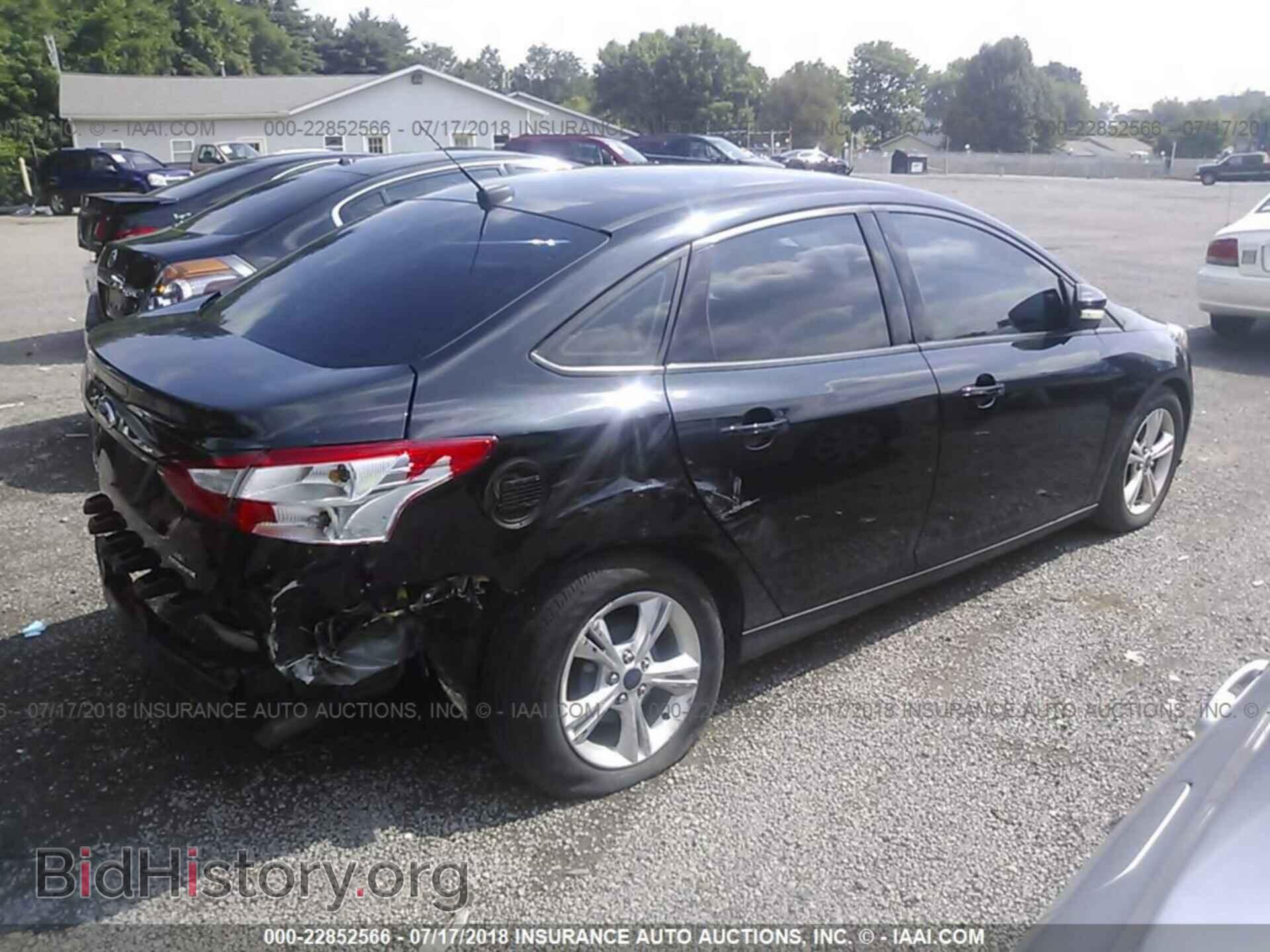 2014 Ford Focus - VIN: 1FADP3F27EL184792 - Photo 4