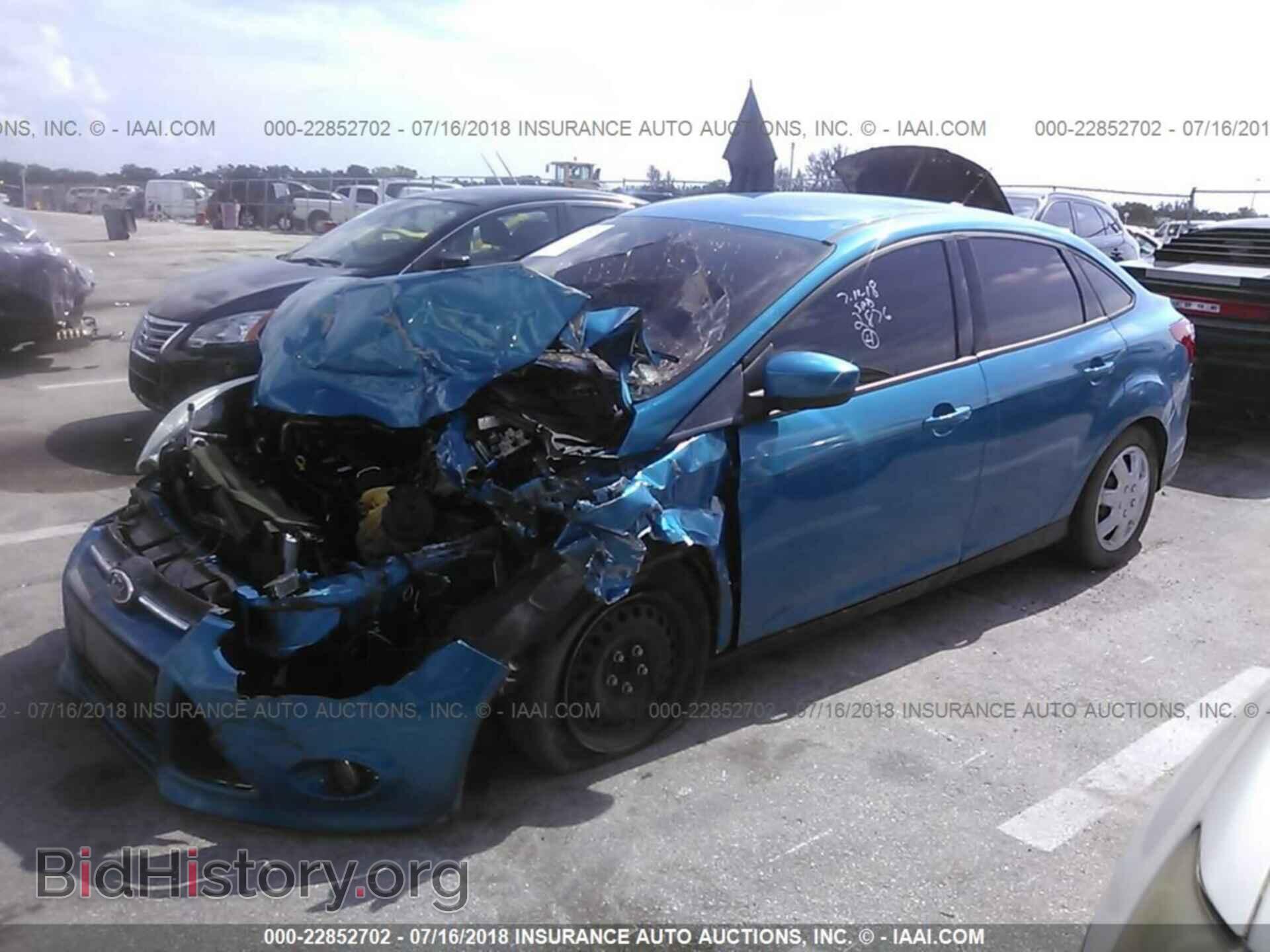 2012 Ford Focus - VIN: 1FAHP3F21CL352876 - Photo 2