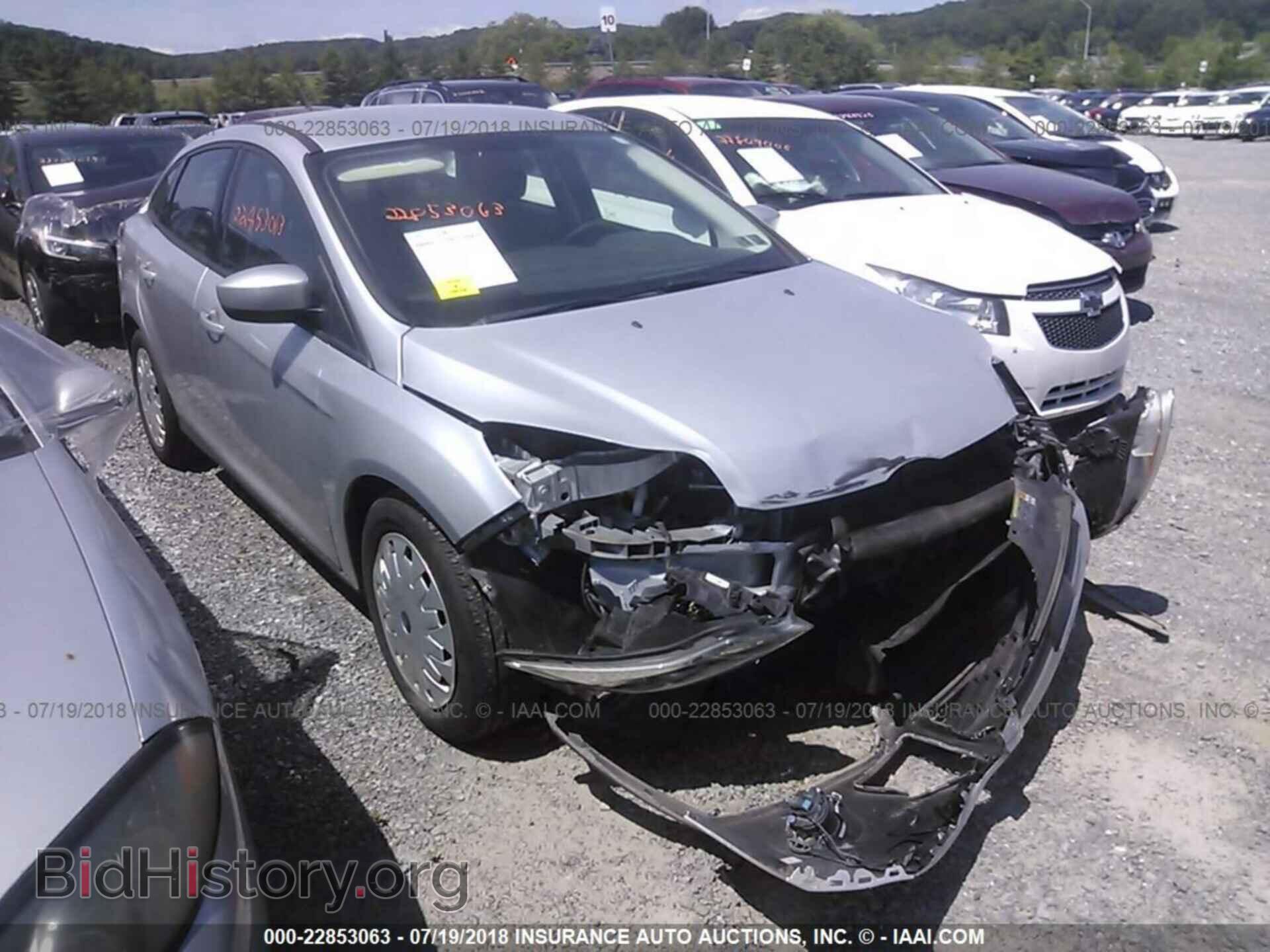 Photo 1FAHP3F28CL310138 - Ford Focus 2012