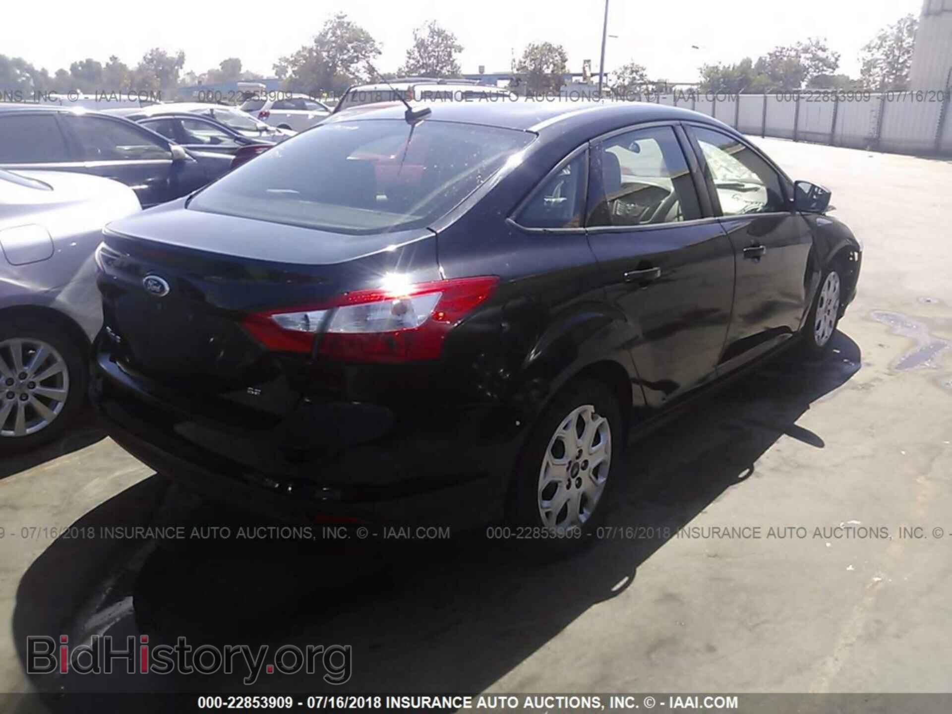 2012 Ford Focus - VIN: 1FAHP3F20CL339701 - Photo 4