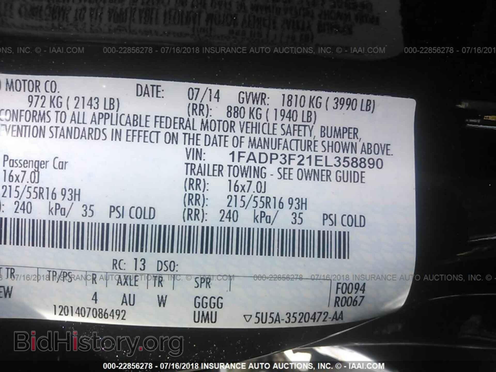 2014 Ford Focus - VIN: 1FADP3F21EL358890 - Photo 9