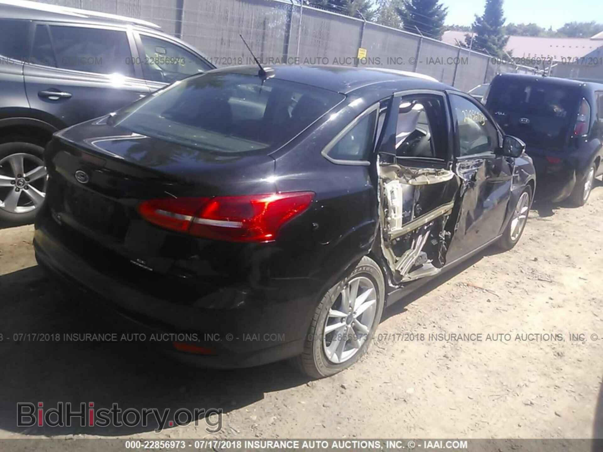 2016 Ford Focus - VIN: 1FADP3F23GL277733 - Photo 4