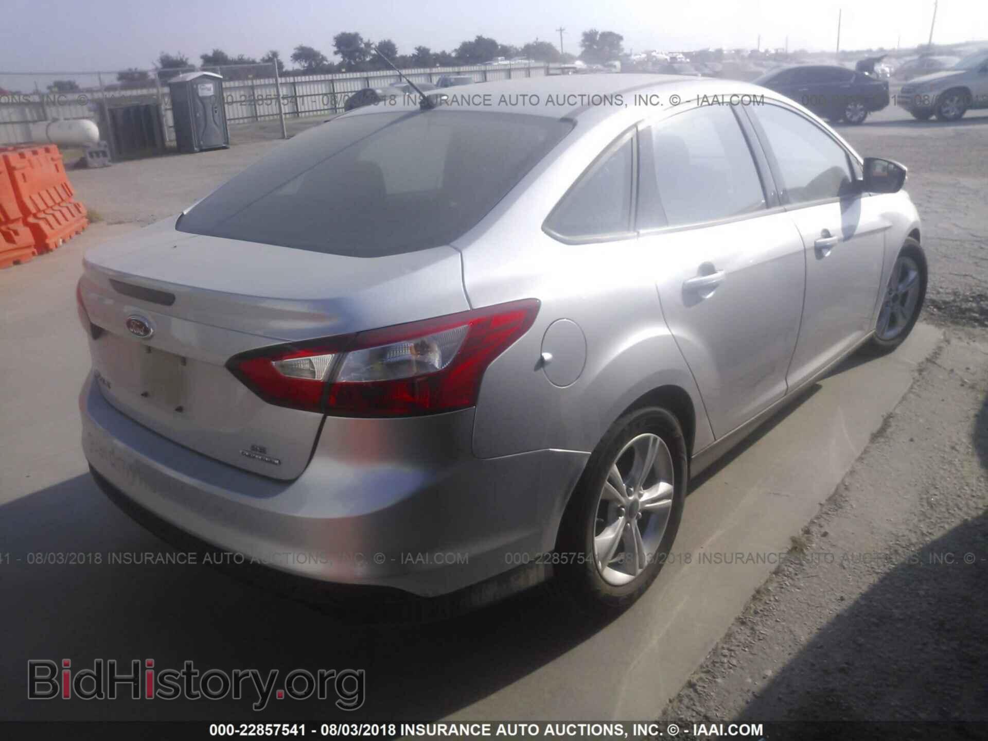 2014 Ford Focus - VIN: 1FADP3F23EL295730 - Фото 4