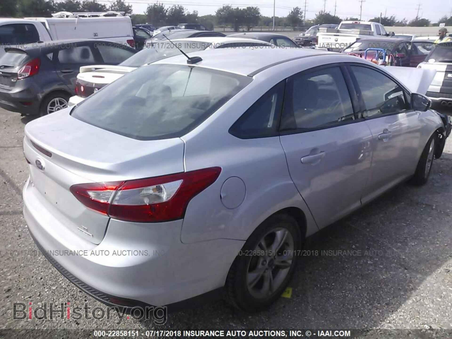2014 Ford Focus - VIN: 1FADP3F24EL157775 - Фото 4