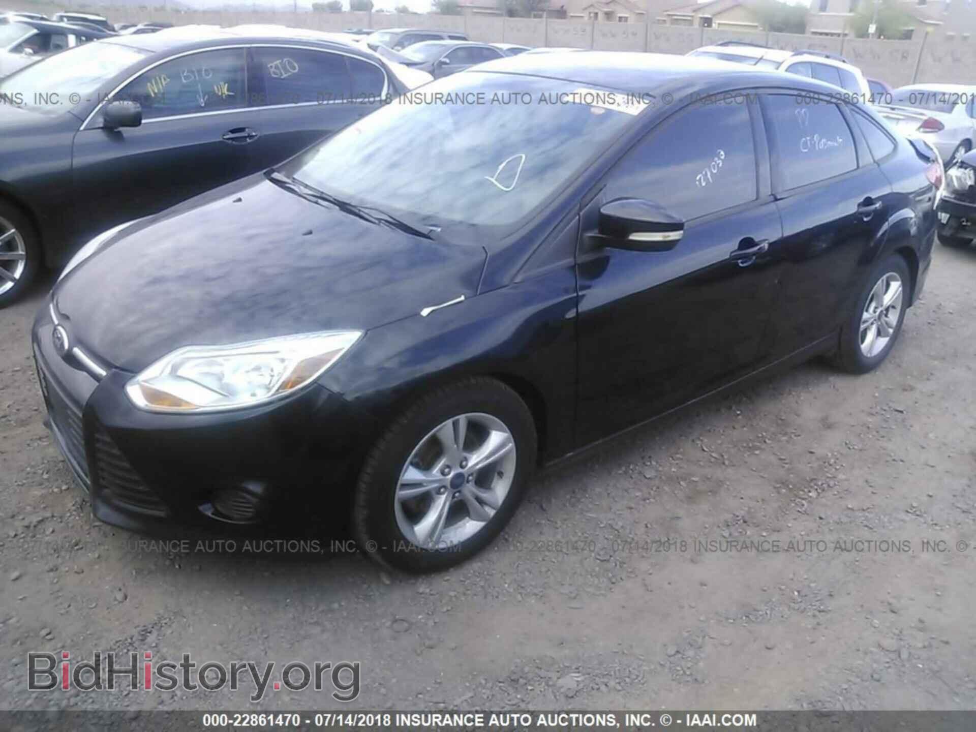 2014 Ford Focus - VIN: 1FADP3F26EL453753 - Фото 2