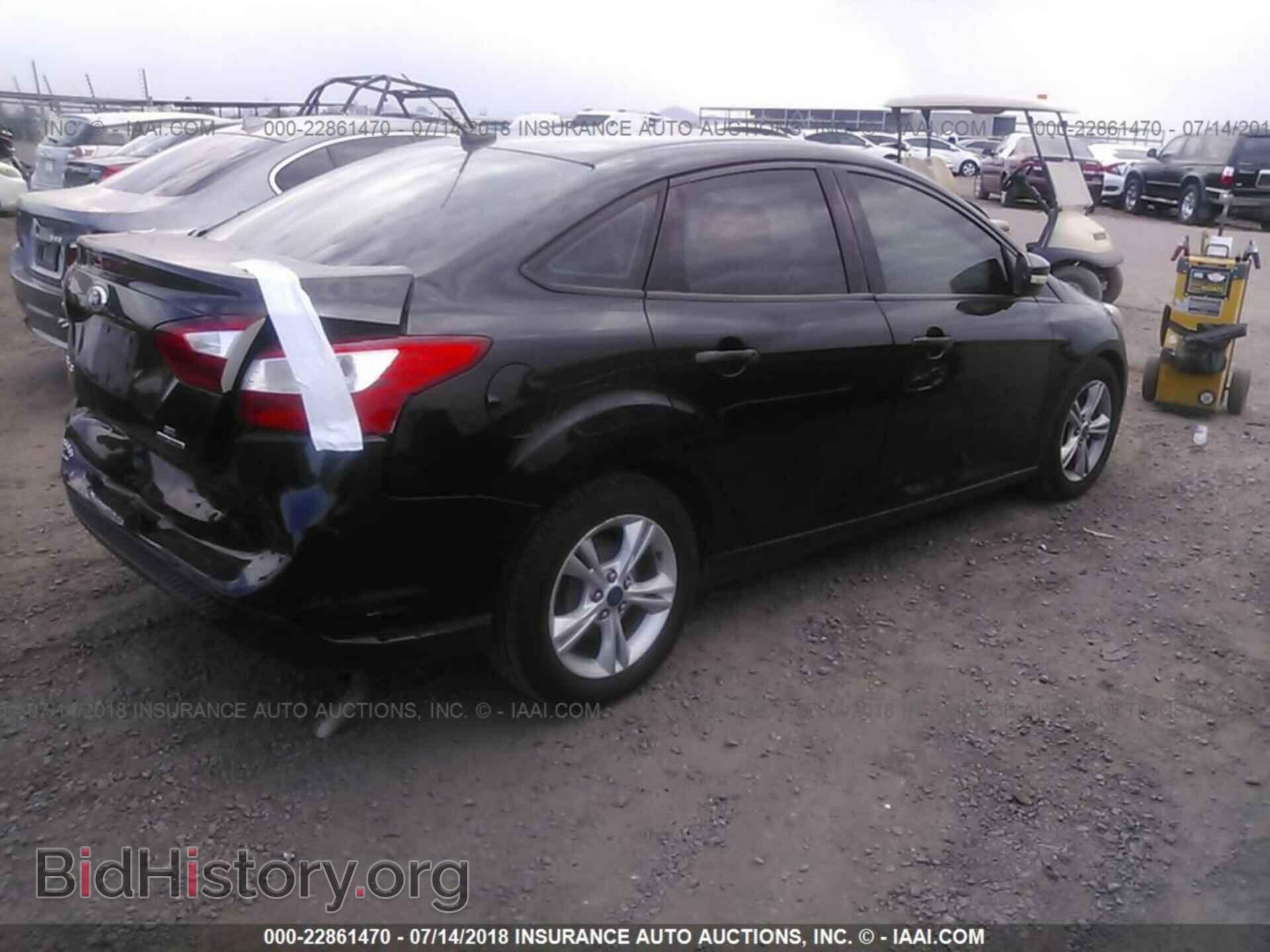 2014 Ford Focus - VIN: 1FADP3F26EL453753 - Фото 4