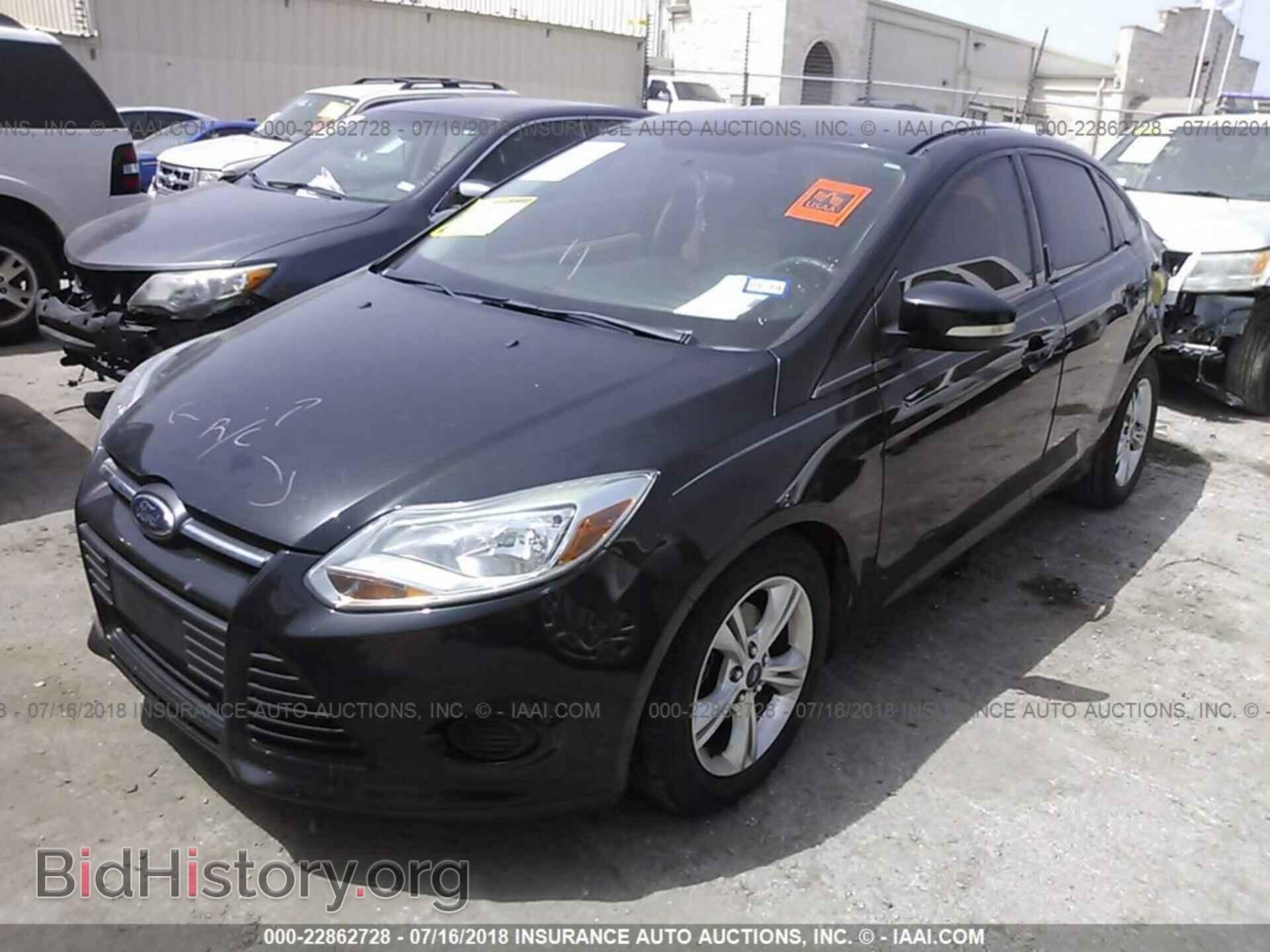2014 Ford Focus - VIN: 1FADP3F20EL218622 - Фото 2