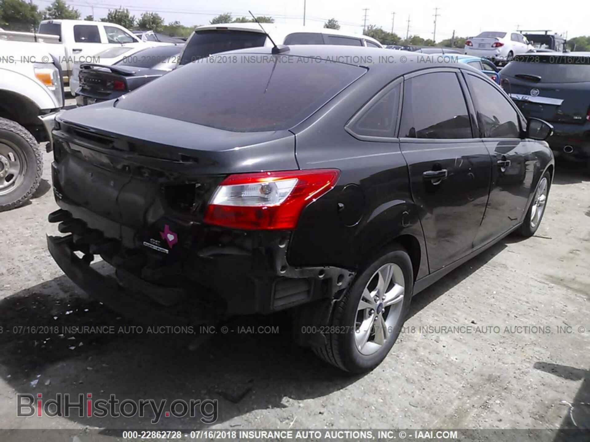 2014 Ford Focus - VIN: 1FADP3F20EL218622 - Фото 4
