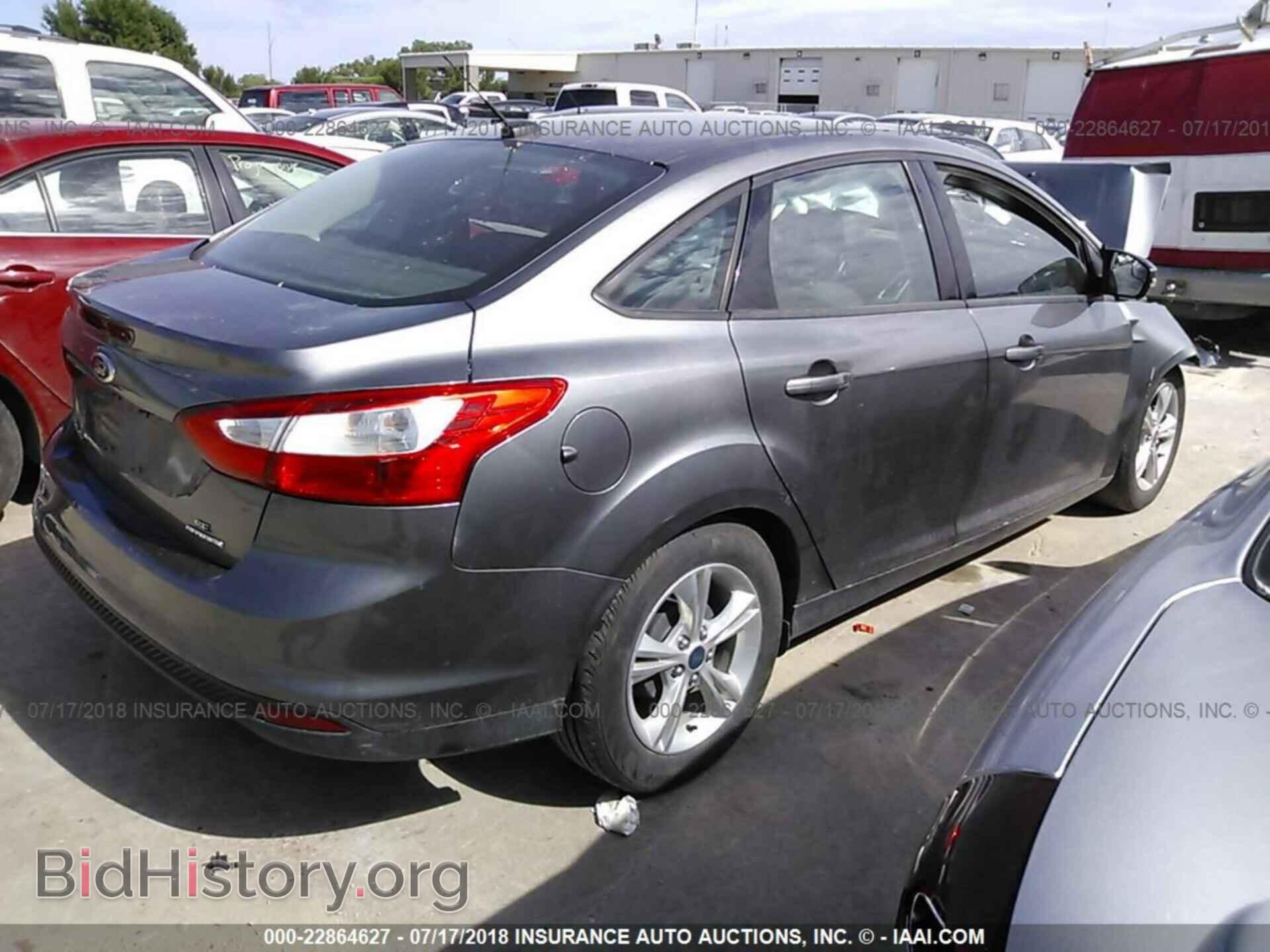 2014 Ford Focus - VIN: 1FADP3F21EL182956 - Photo 4