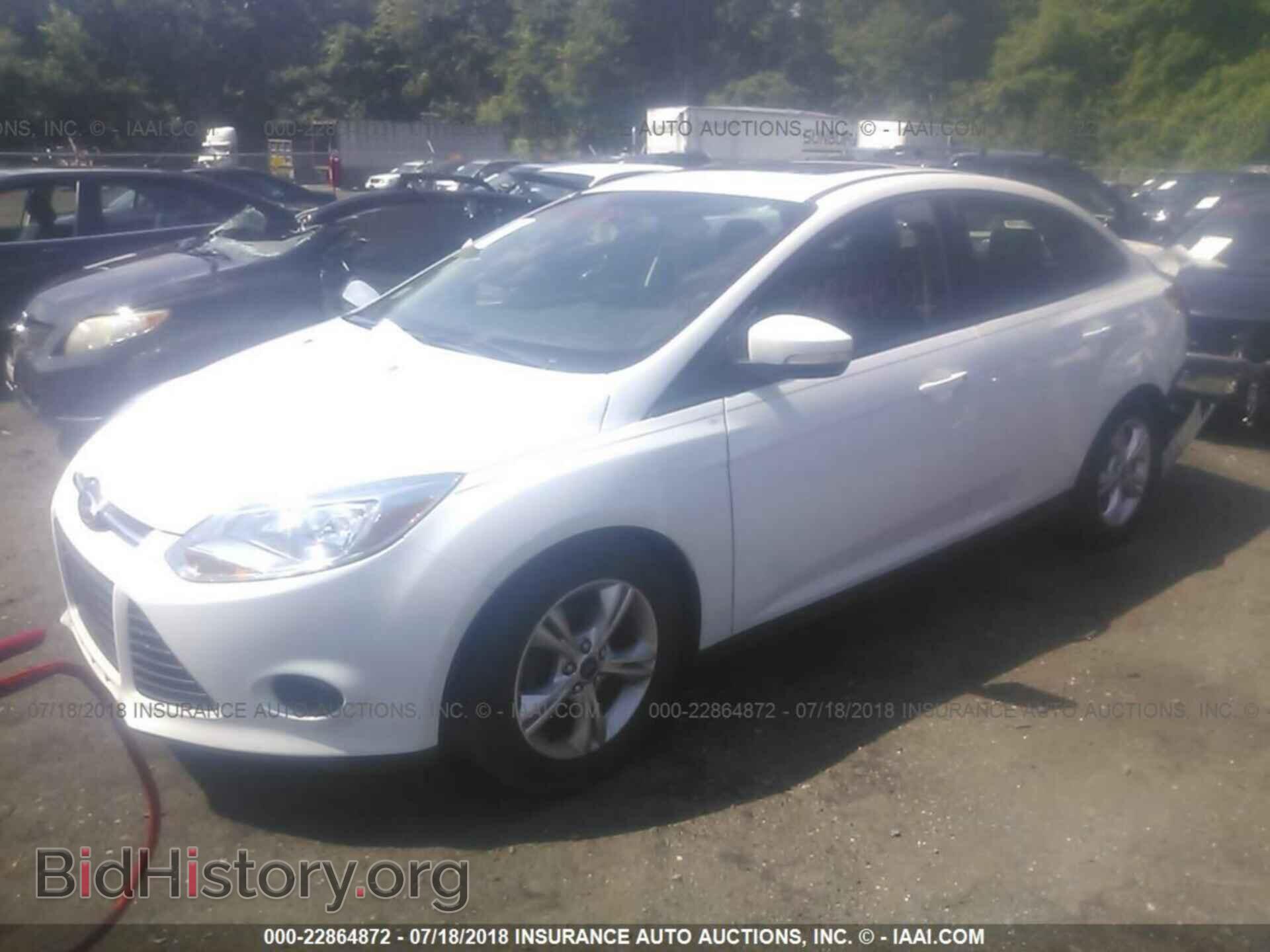 2014 Ford Focus - VIN: 1FADP3F29EL306391 - Photo 2