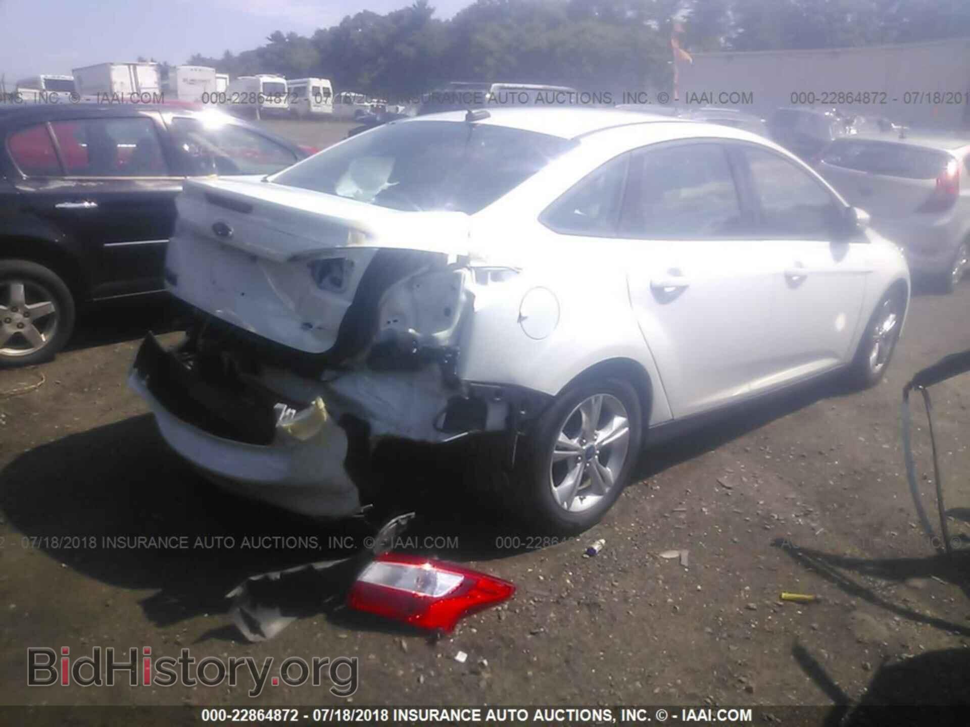 2014 Ford Focus - VIN: 1FADP3F29EL306391 - Photo 4