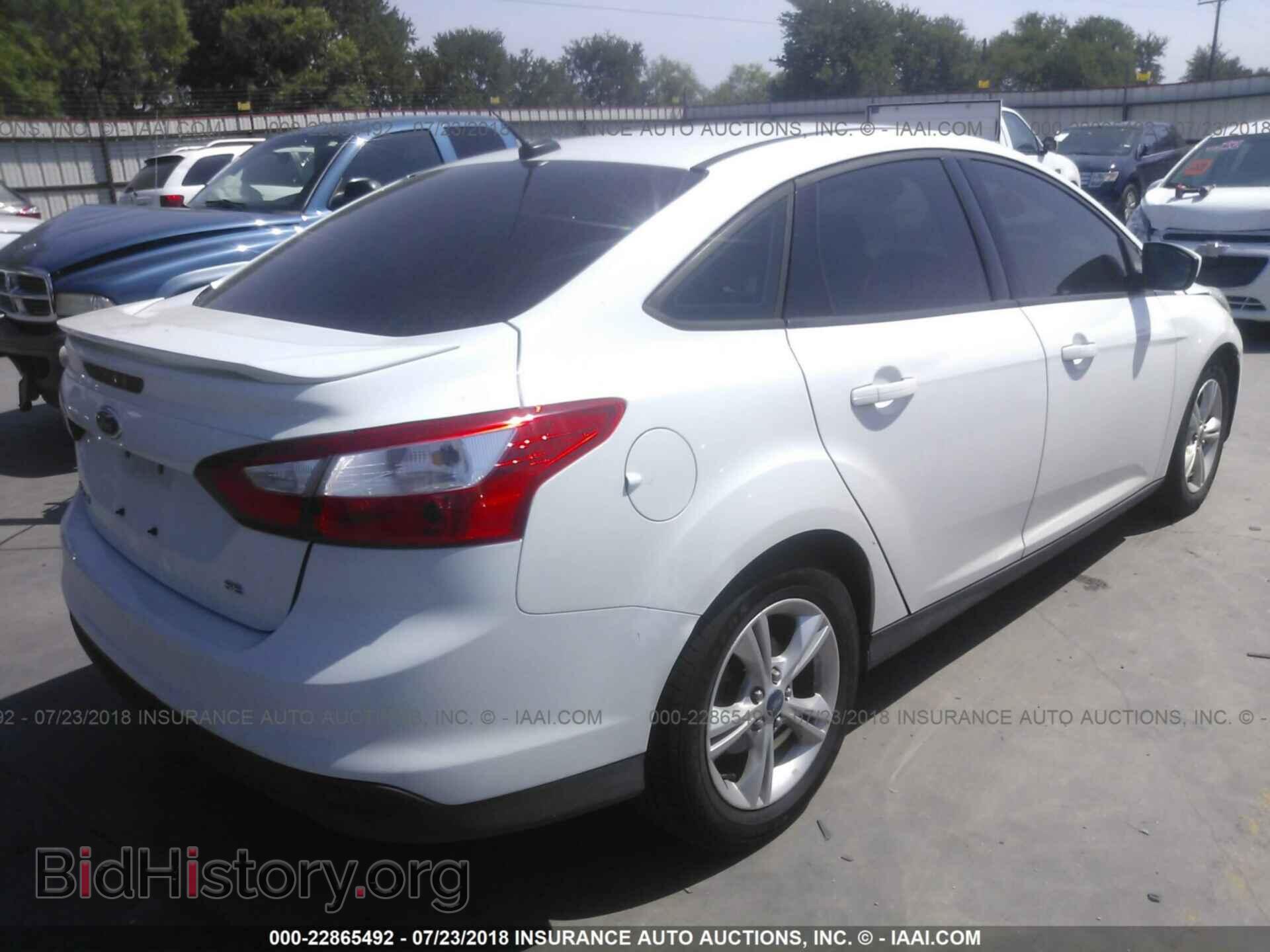 2012 Ford Focus - VIN: 1FAHP3F27CL403328 - Фото 4