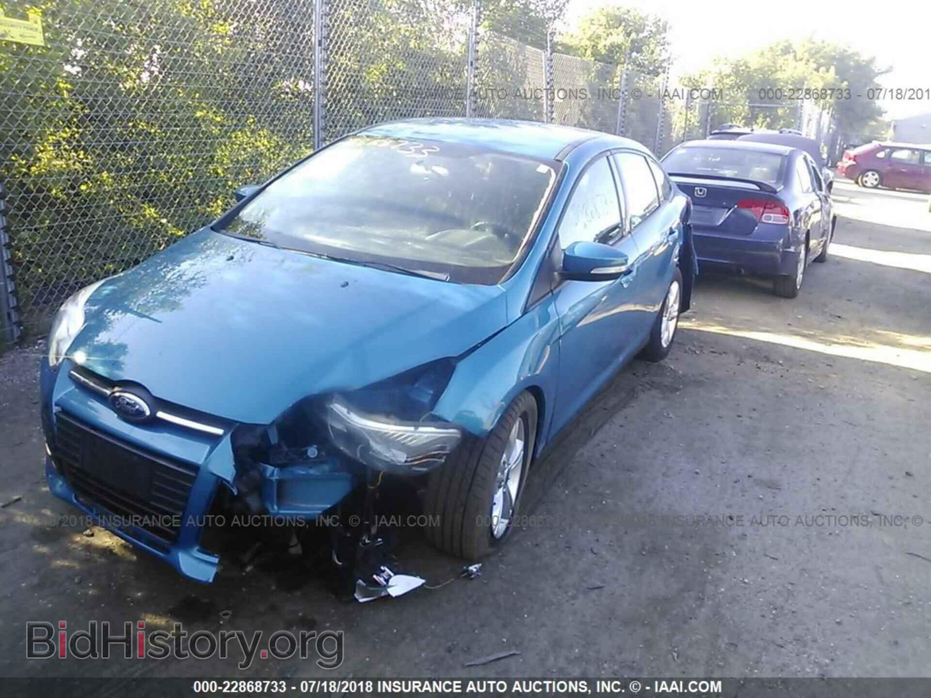 2013 Ford Focus - VIN: 1FADP3F20DL370558 - Photo 2
