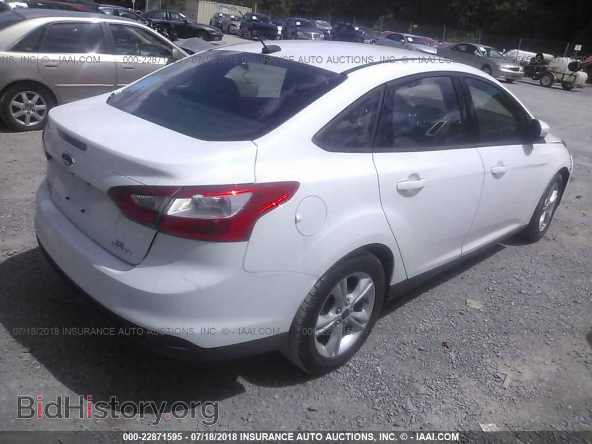 2014 Ford Focus - VIN: 1FADP3F28EL411987 - Photo 4