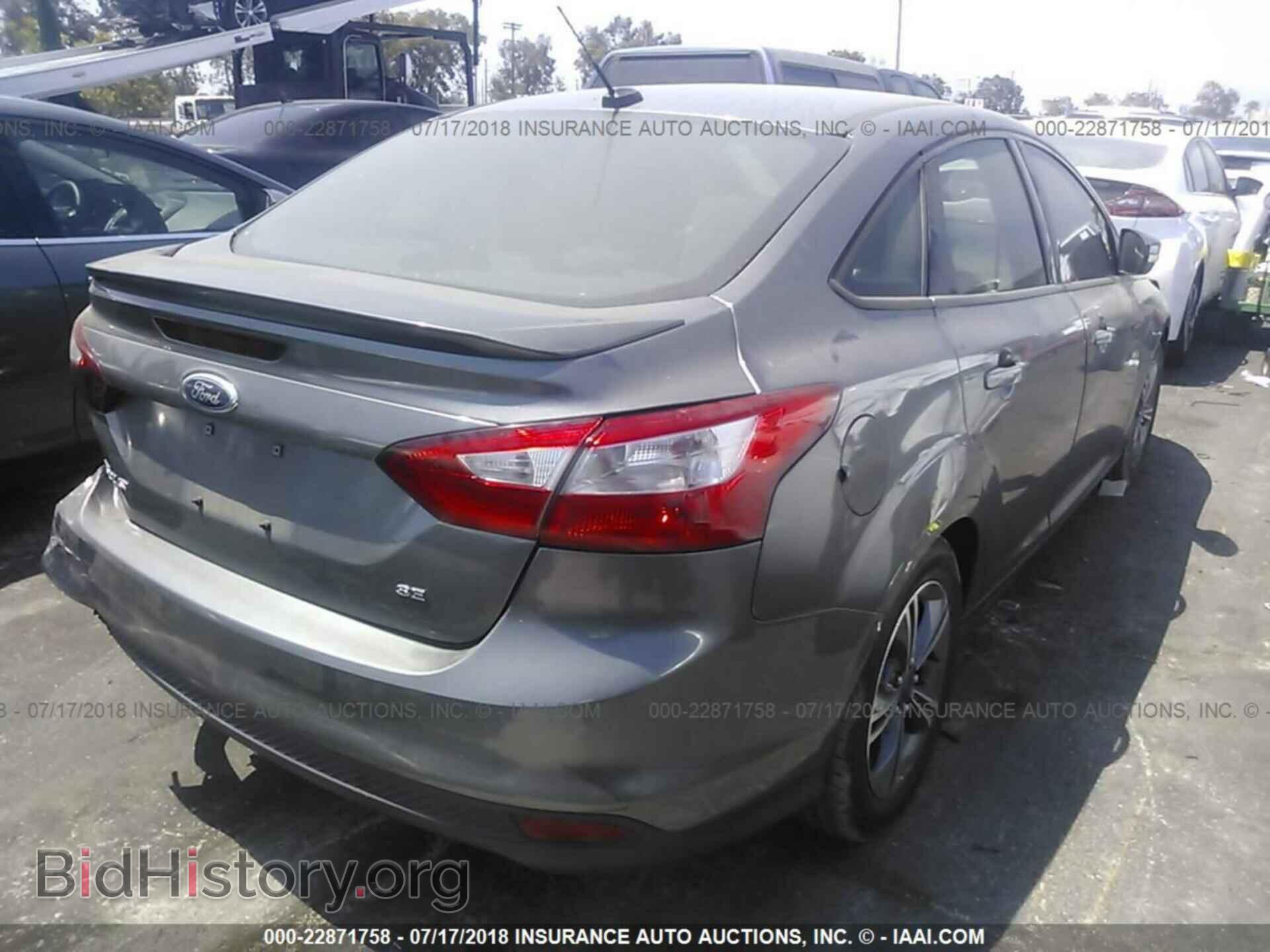 2014 Ford Focus - VIN: 1FADP3F27EL247633 - Фото 4