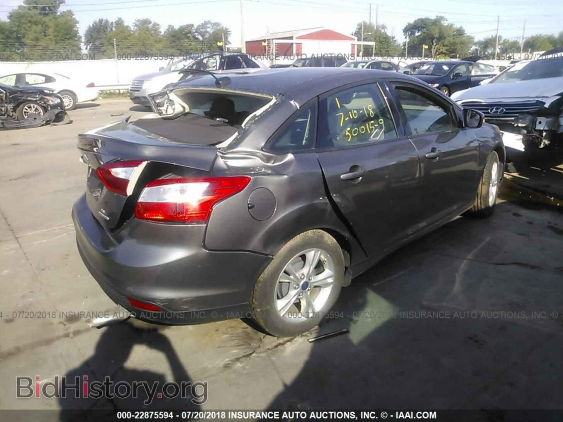 2014 Ford Focus - VIN: 1FADP3F25EL236856 - Photo 4