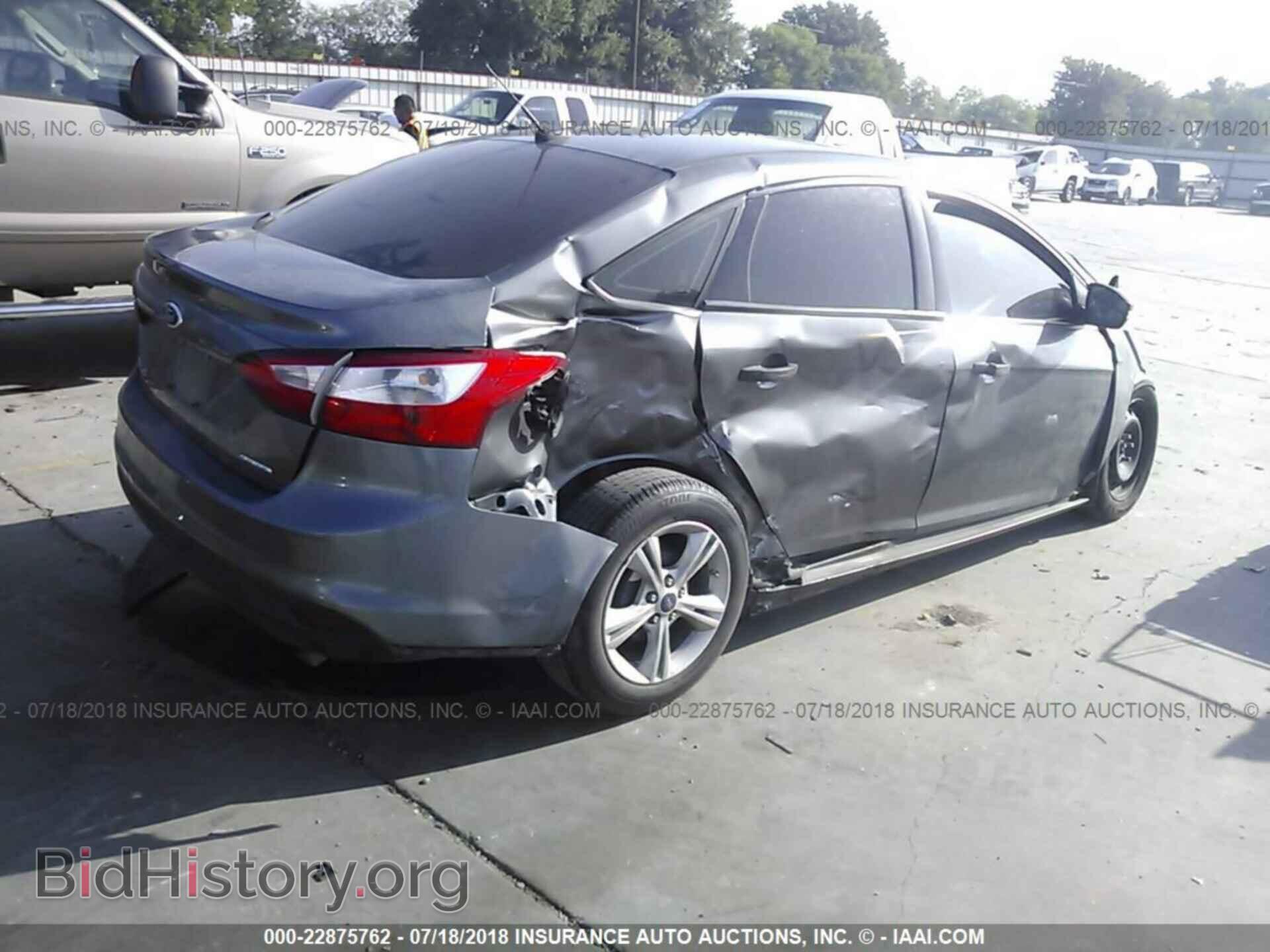 2014 Ford Focus - VIN: 1FADP3E27EL311252 - Photo 4