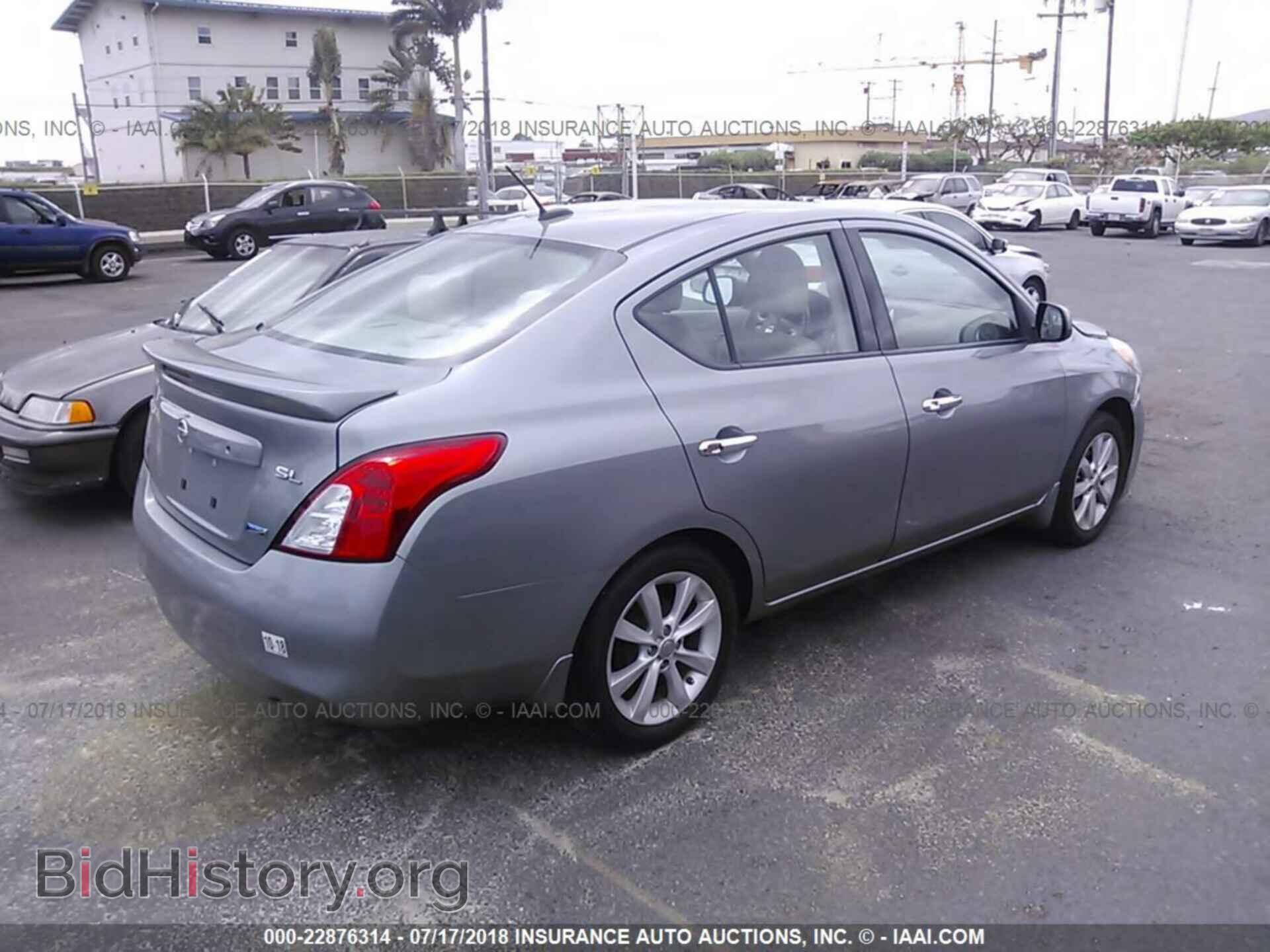 2014 Nissan Versa - VIN: 3N1CN7AP2EL800489 - Фото 4