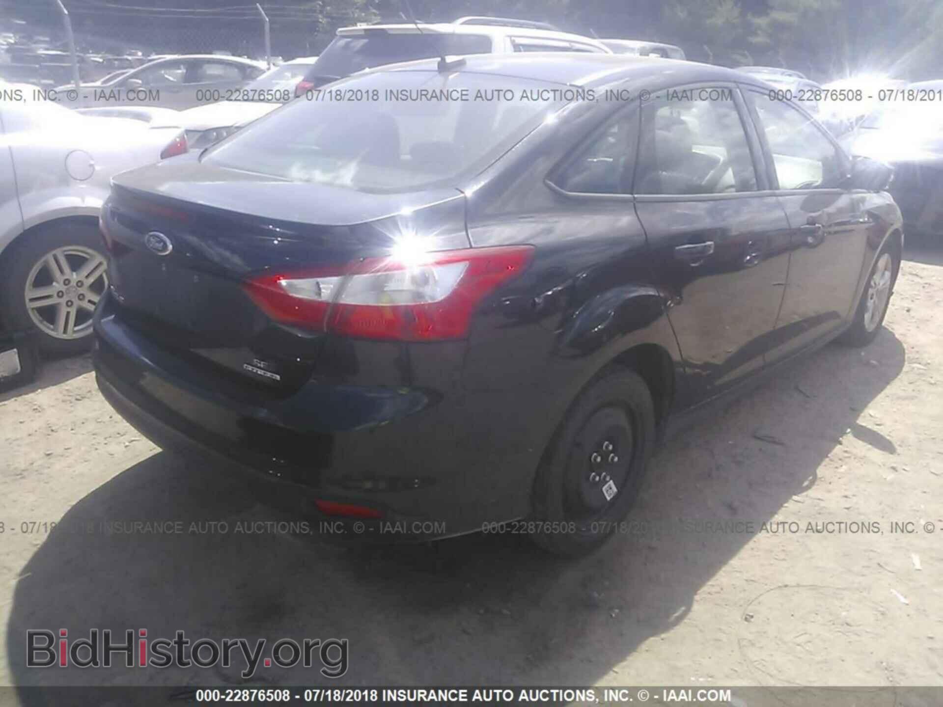 2013 Ford Focus - VIN: 1FADP3F21DL324446 - Фото 4