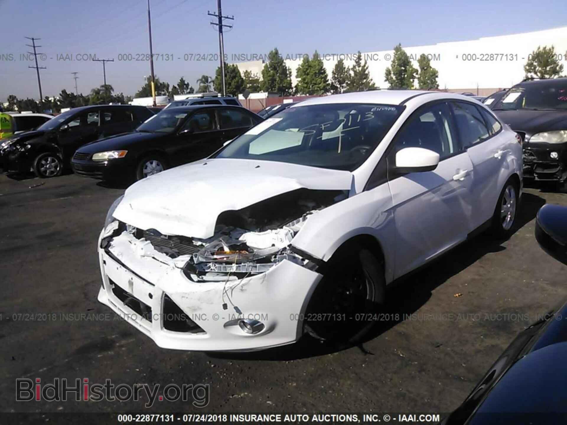 2012 Ford Focus - VIN: 1FAHP3F25CL141597 - Photo 2