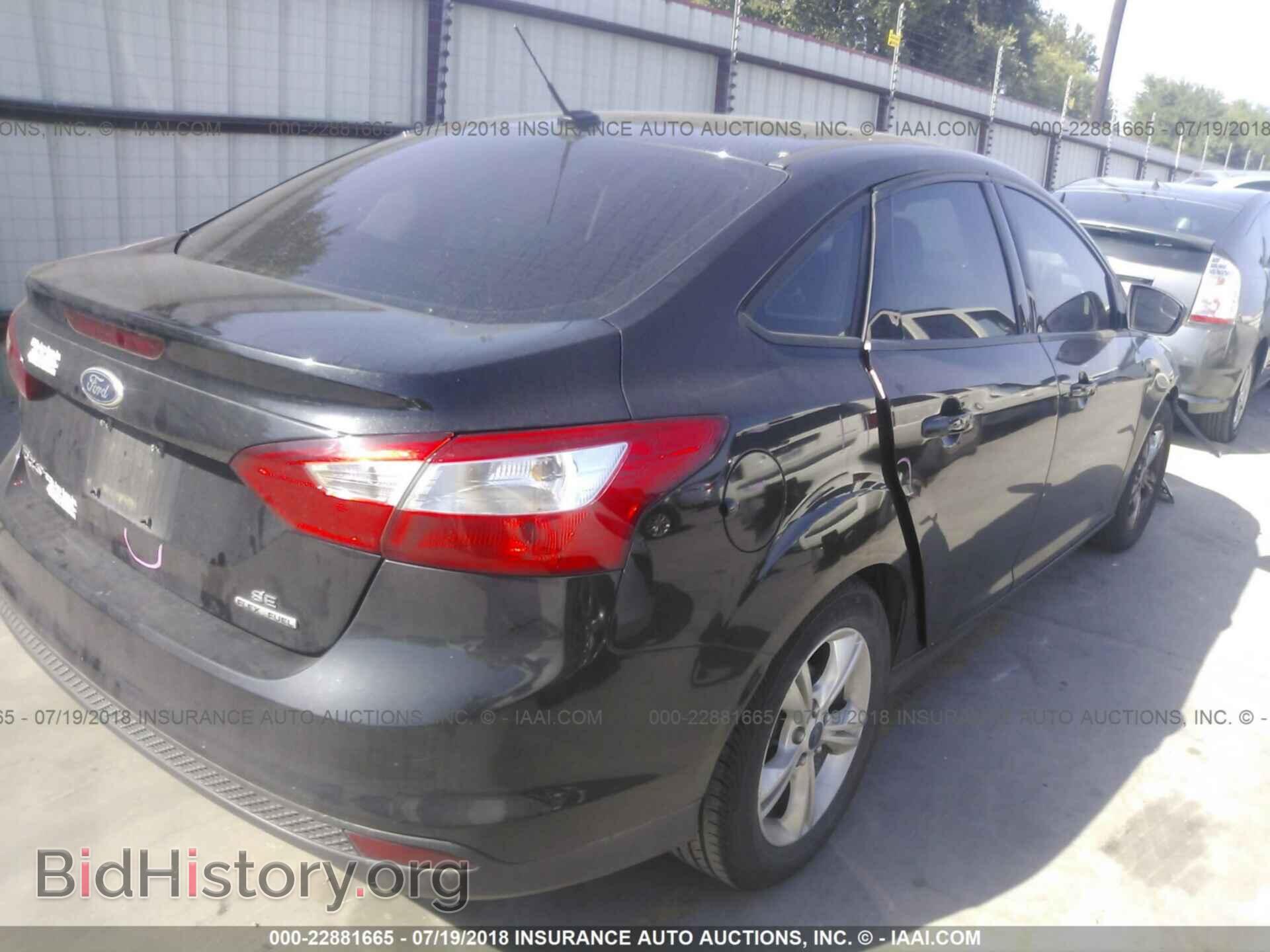 2014 Ford Focus - VIN: 1FADP3F23EL406342 - Фото 4