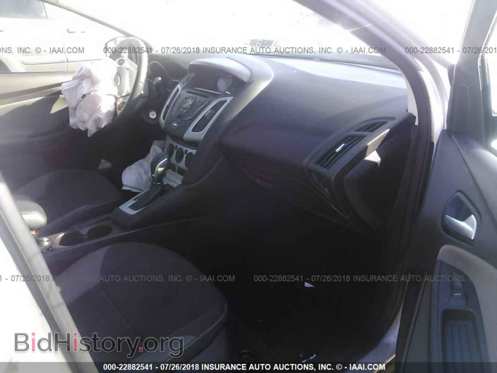 2014 Ford Focus - VIN: 1FADP3F24EL203797 - Фото 5