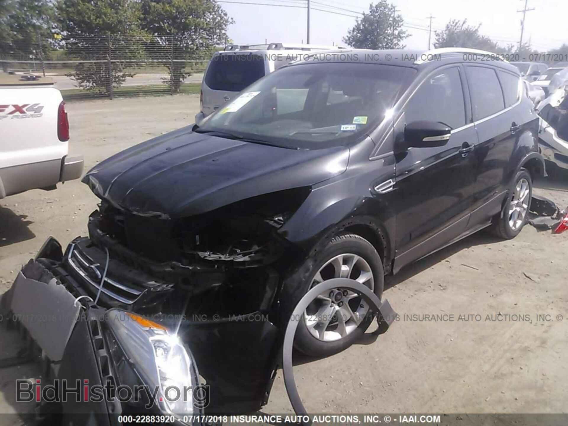 2014 Ford Escape - VIN: 1FMCU0JX0EUB15240 - Photo 2