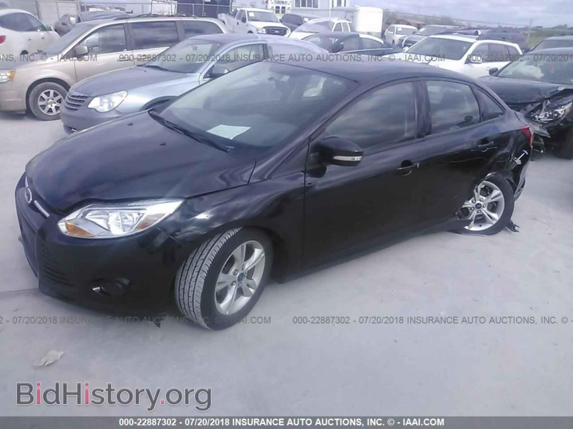 2014 Ford Focus - VIN: 1FADP3F2XEL339660 - Photo 2